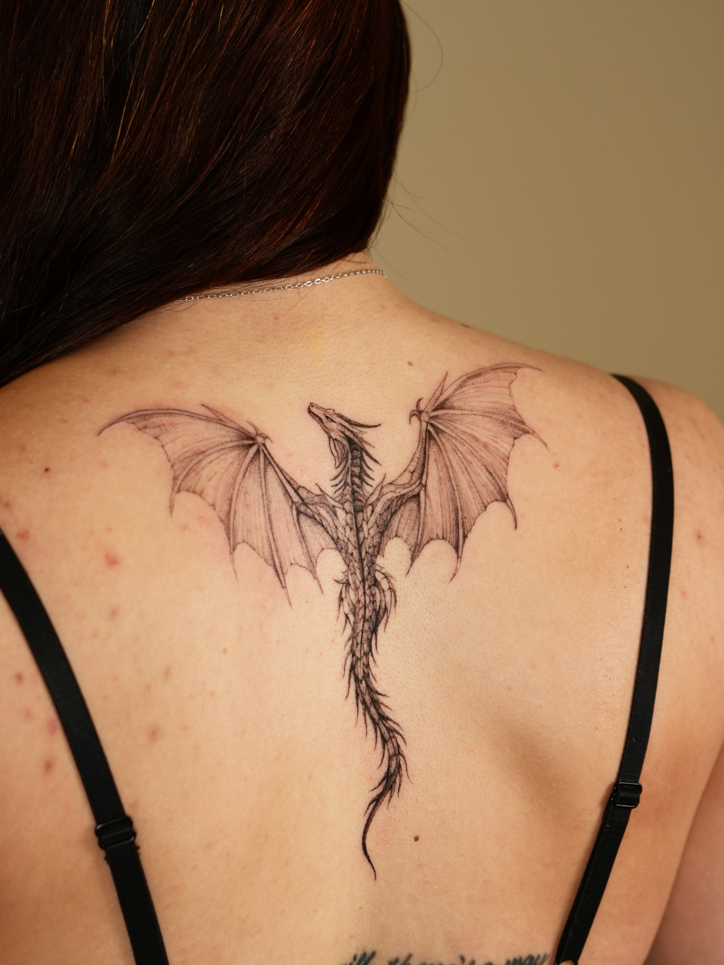 Dragon black and grey tattoo on the back by Eleana, North Miami, Florida