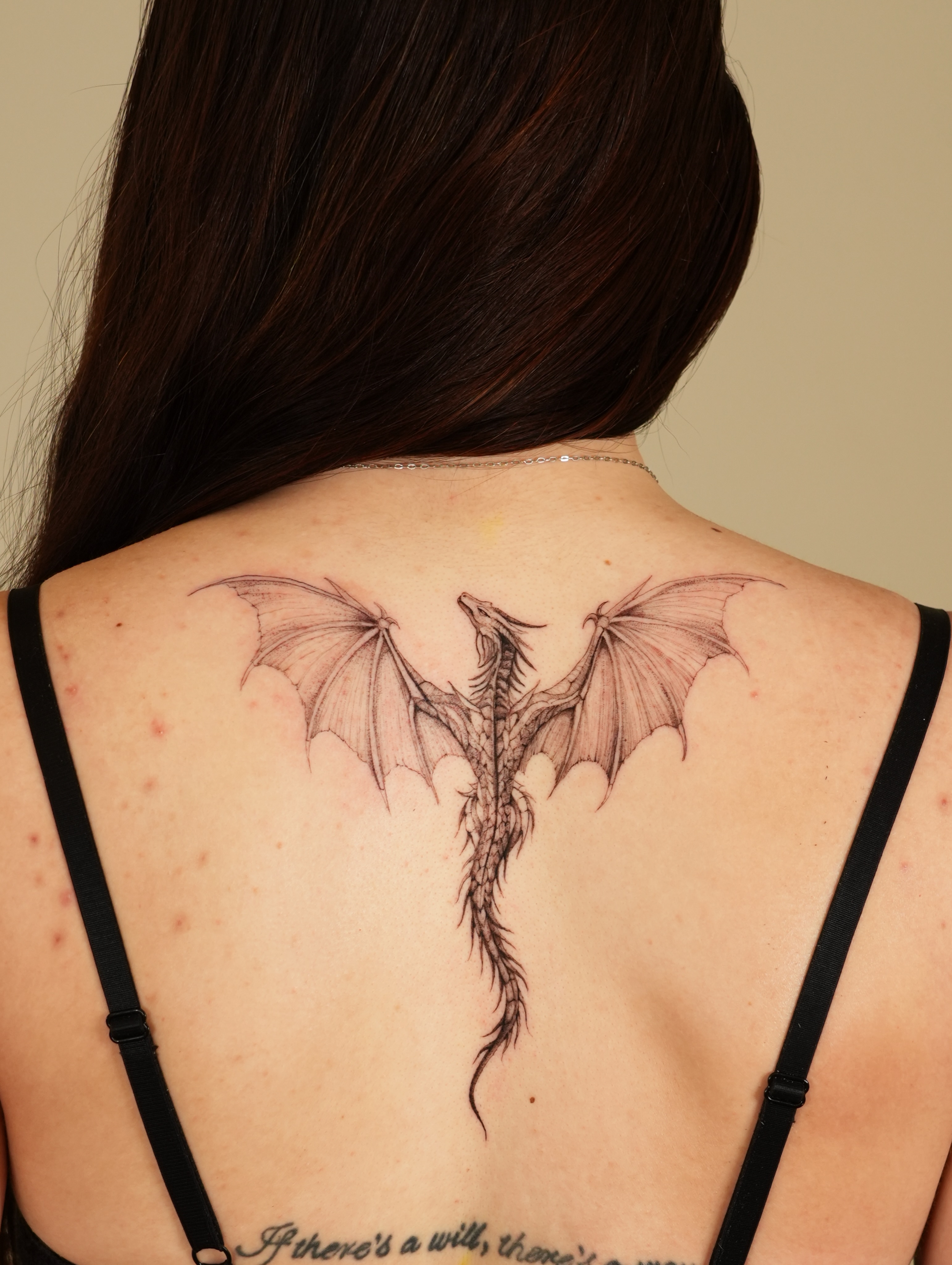 Dragon black and grey tattoo on the back by Eleana, North Miami, Florida