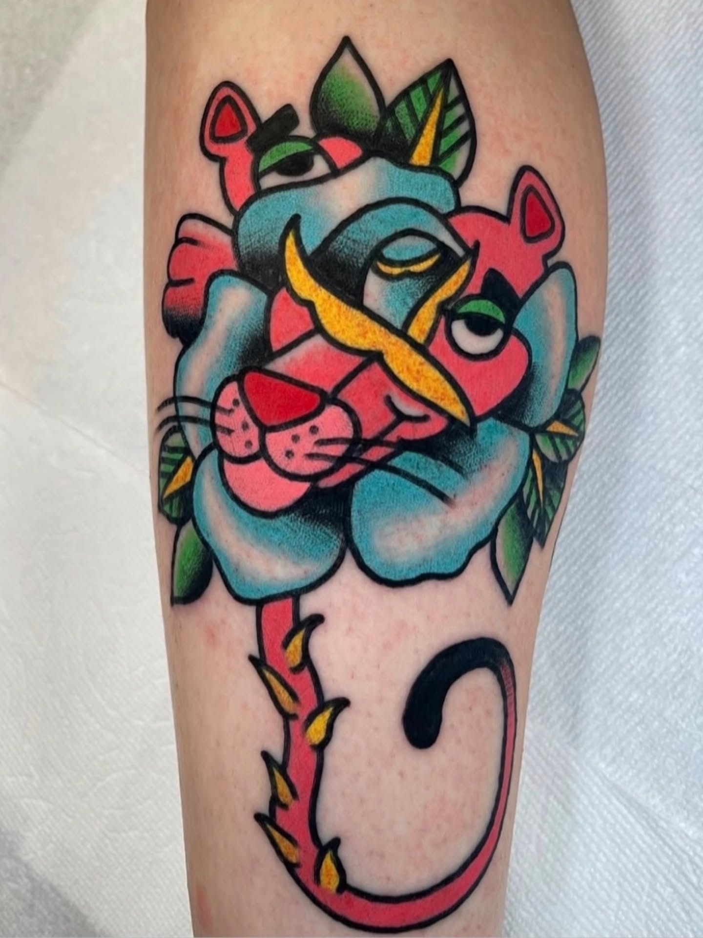 Cat American traditional tattoo on the forearm by Don Lee