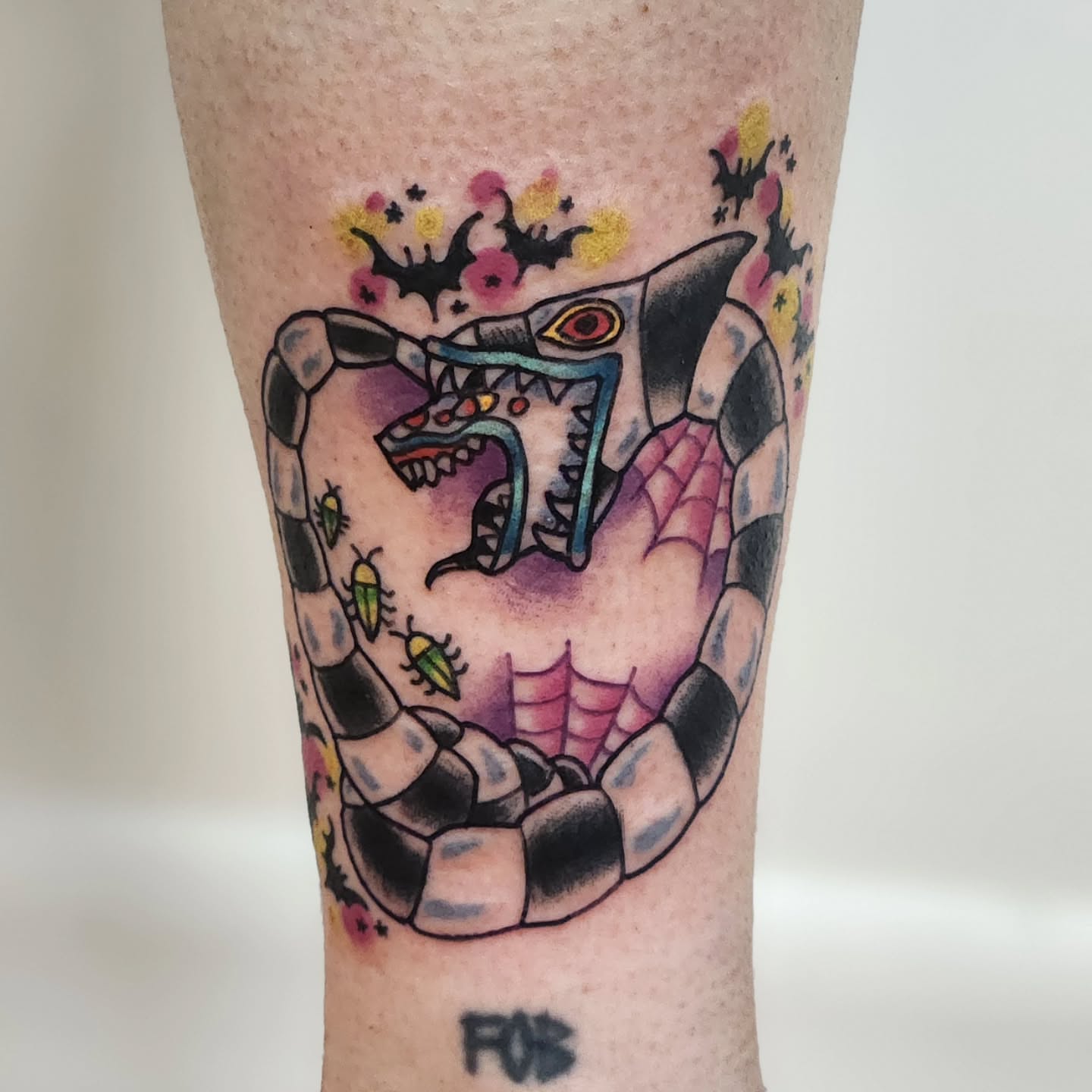 Snake and bat American traditional tattoo on the forearm by Sonya ๐ฟ๐ธ๐พ