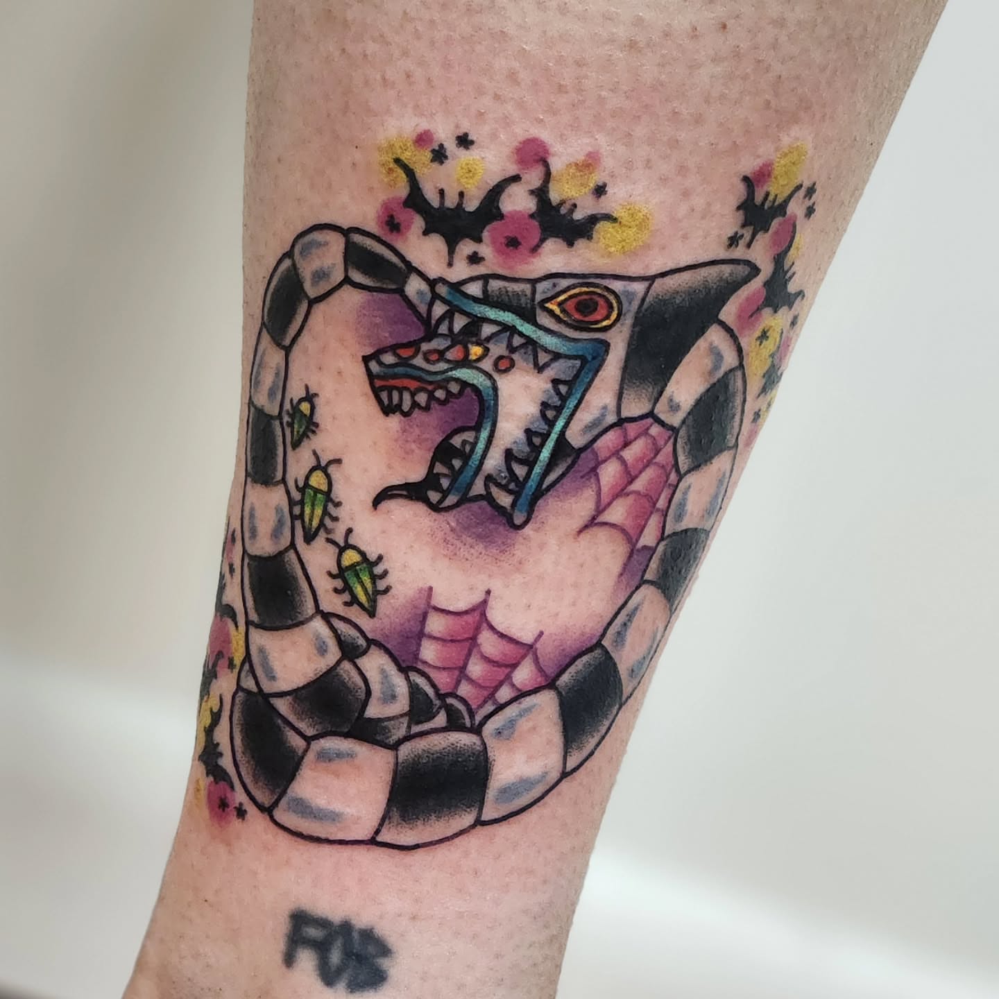 Snake and bugs American traditional tattoo on the forearm by Sonya ๐ฟ๐ธ๐พ