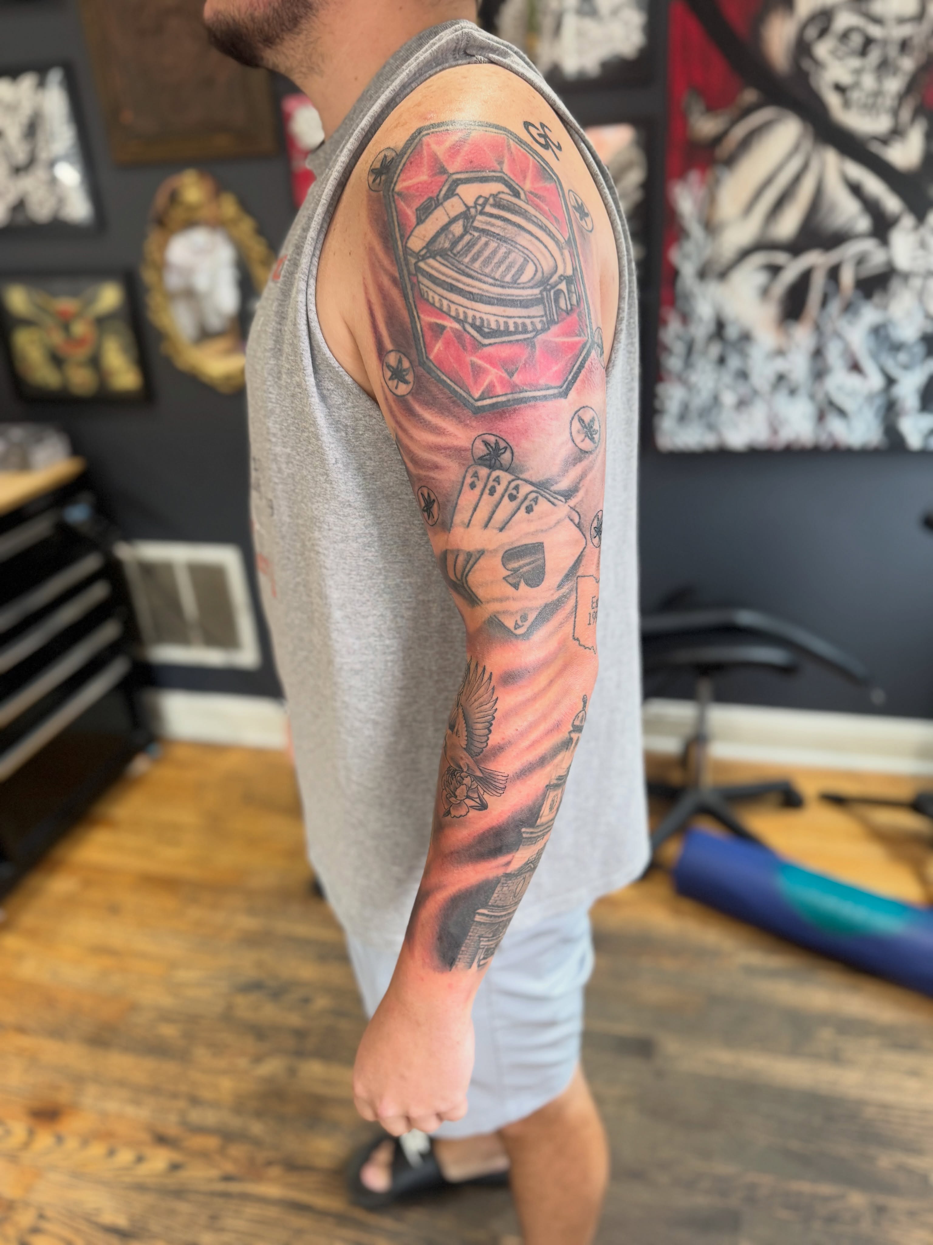 Football helmet geometric tattoo on the upper arm by Eric James, Columbus, Ohio