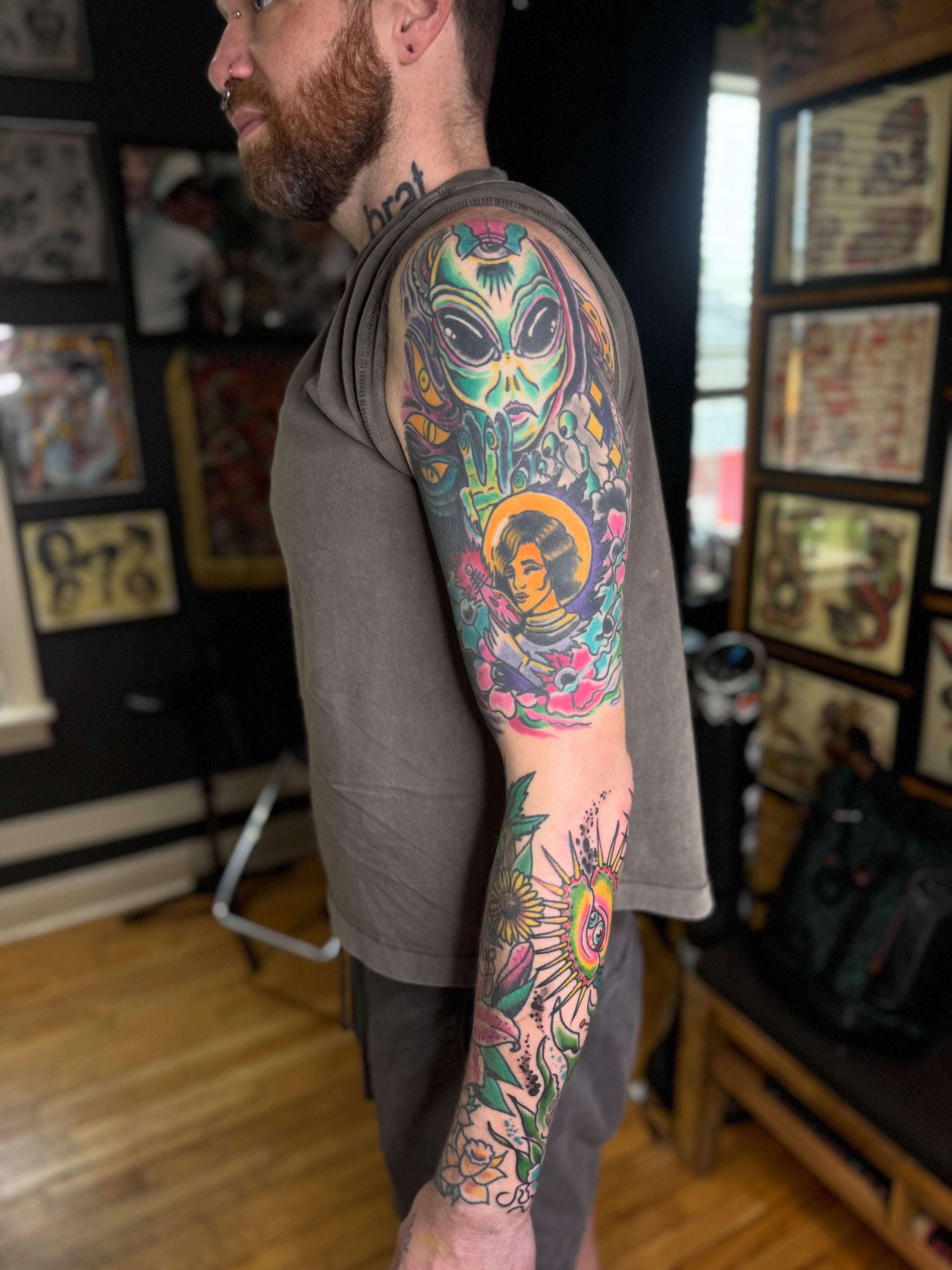 Alien and floral American traditional tattoo on the forearm by Eric James, Columbus, Ohio