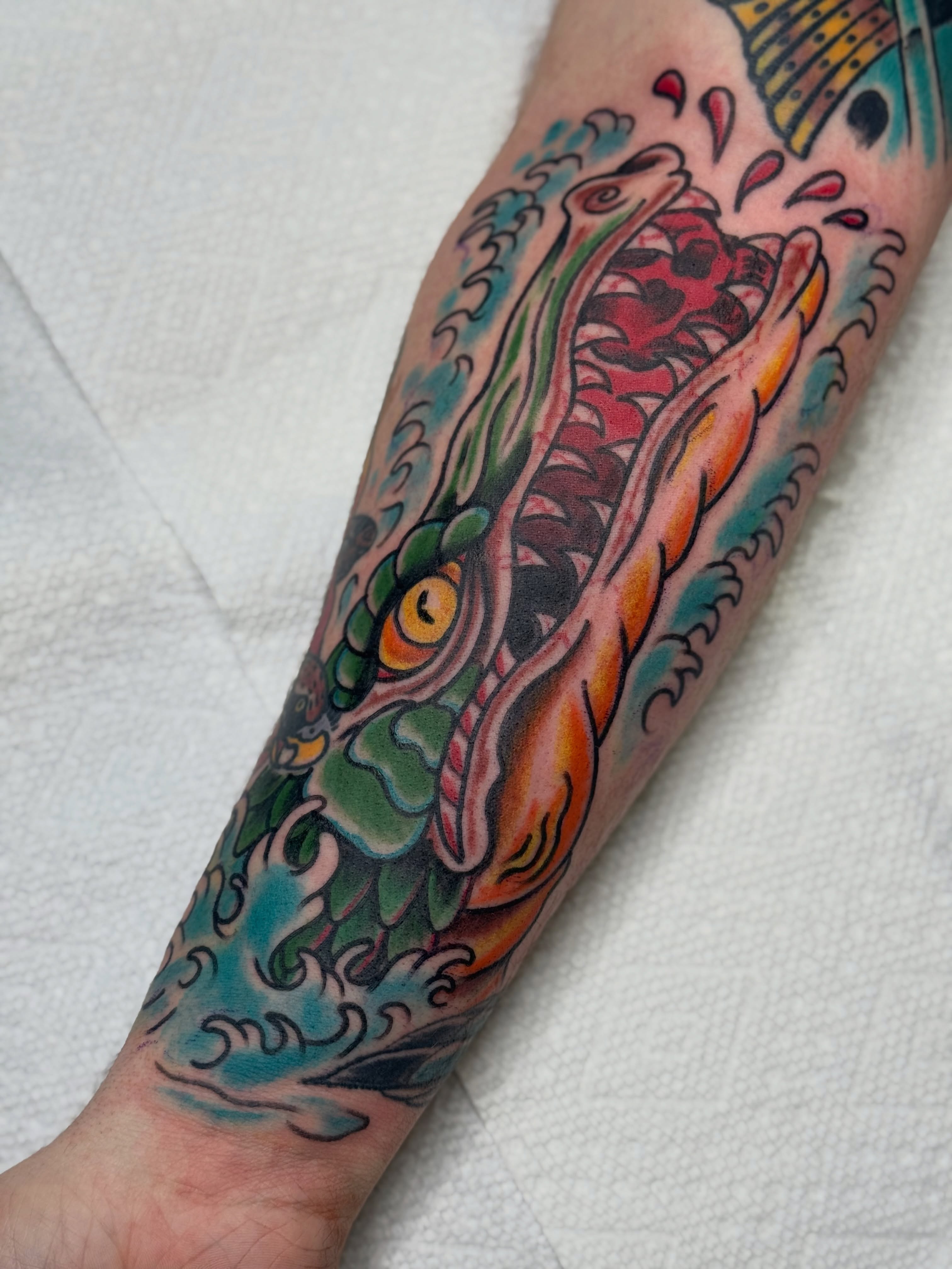 Dragon American traditional tattoo on the forearm by Eric James, Columbus, Ohio