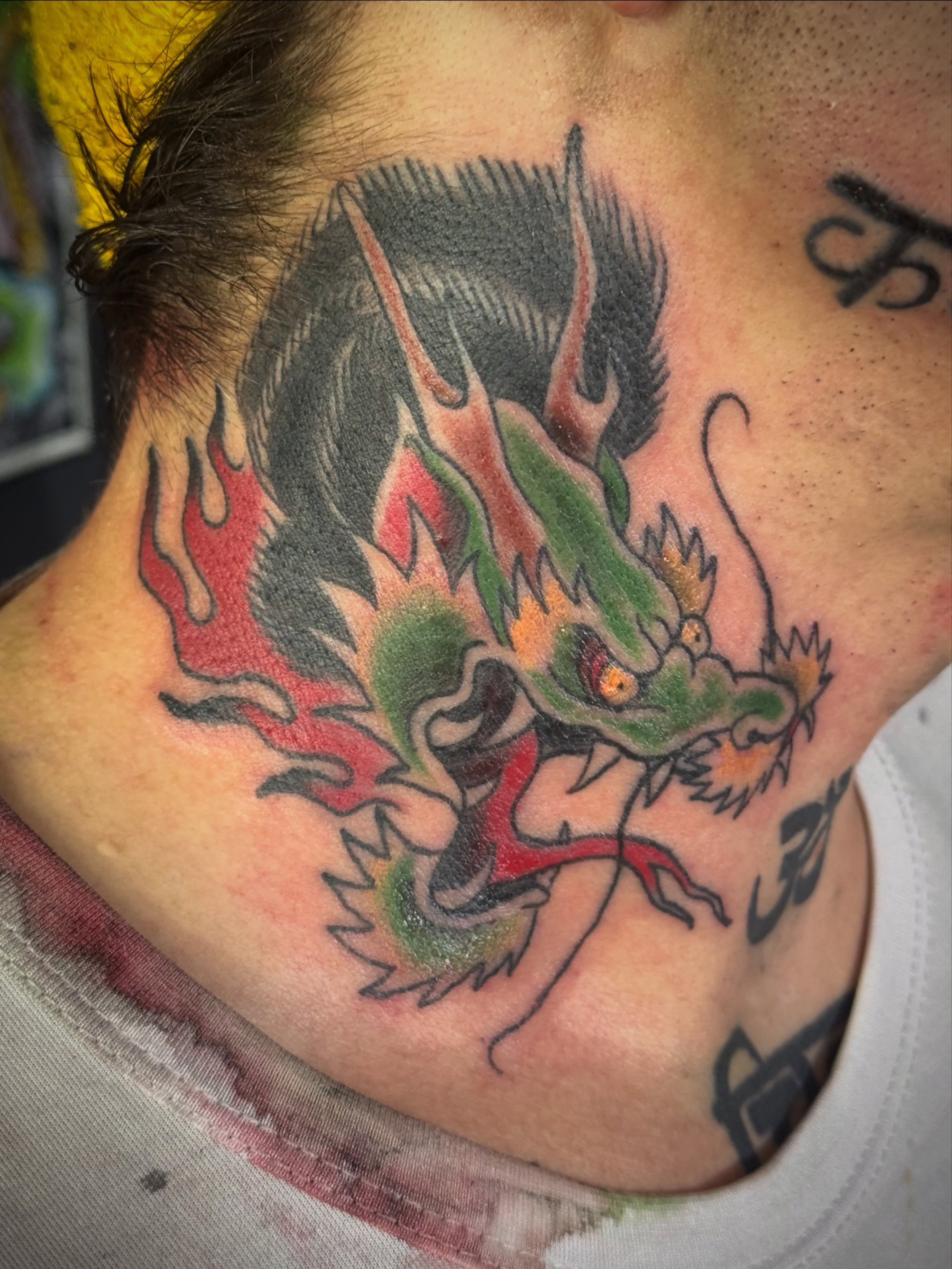 Dragon American traditional tattoo on the neck by Eric James, Columbus, Ohio