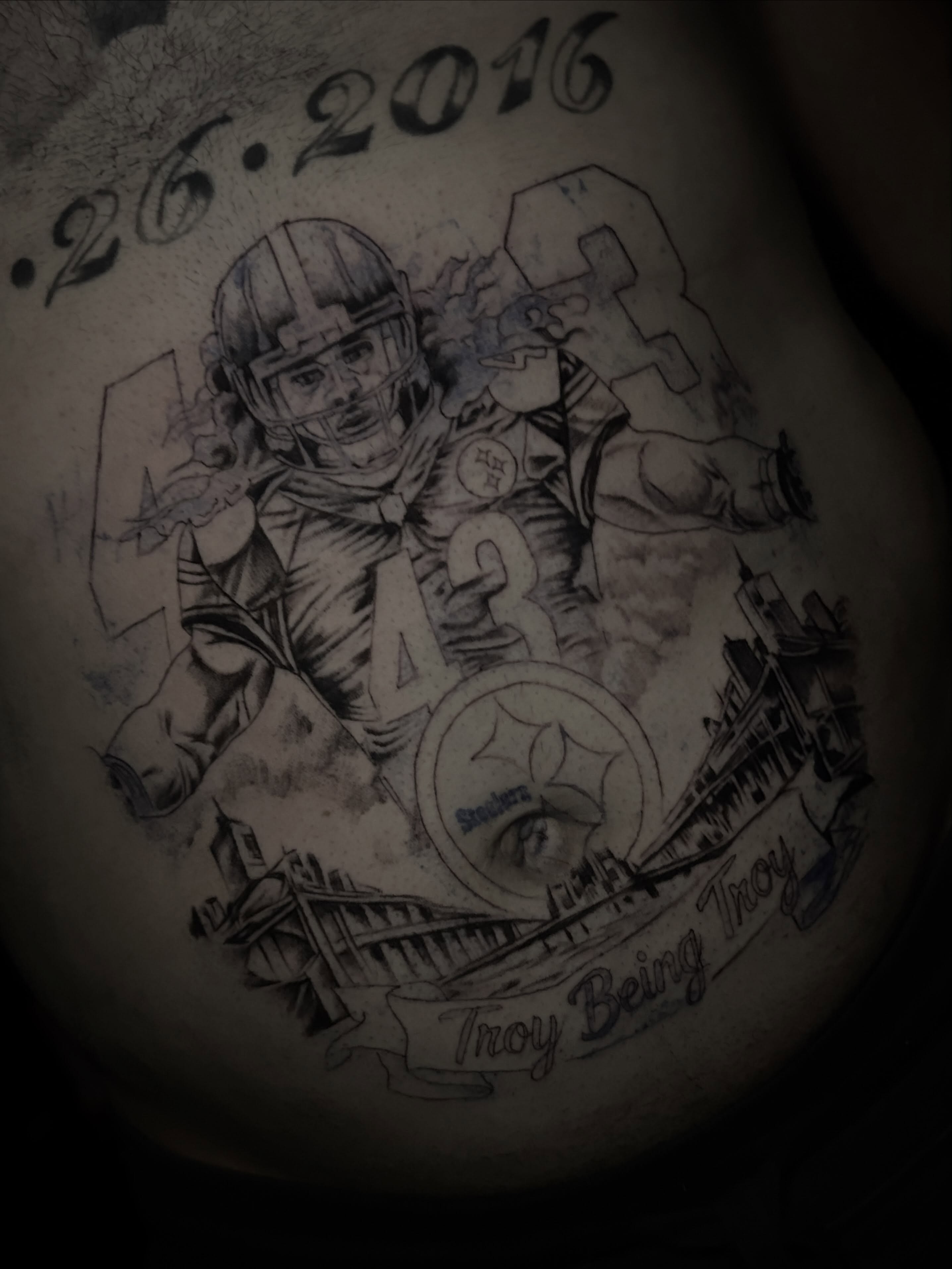 Football player realism tattoo on the torso by Marky