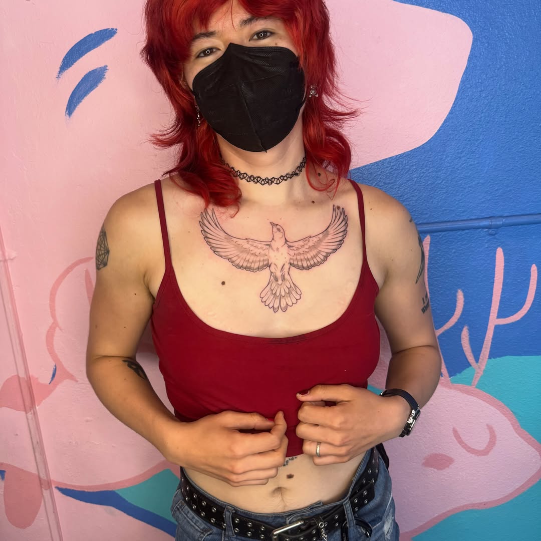 Bird realism tattoo on the chest by Ivy