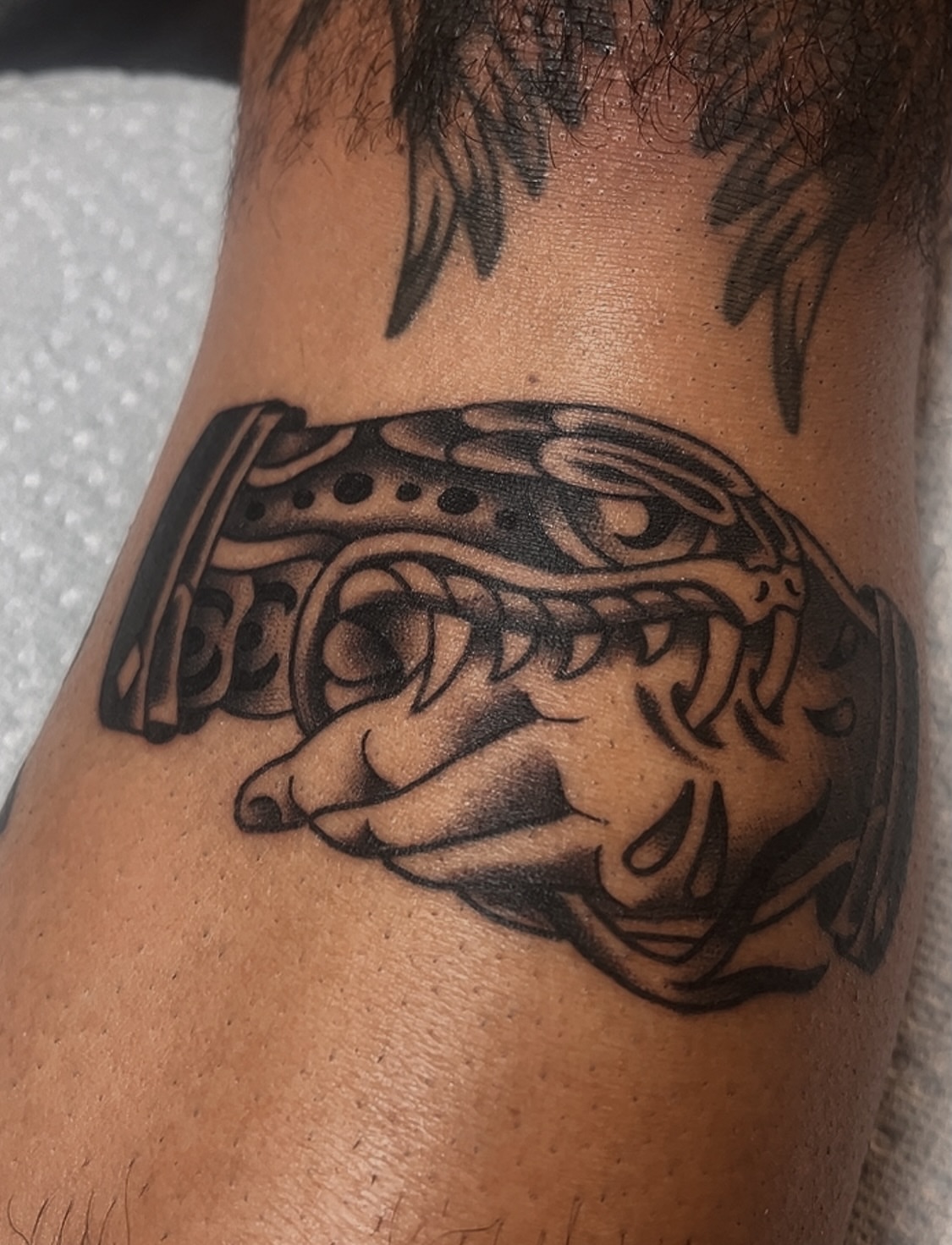 Mechanical hand black and grey tattoo on the forearm by Las Vegas Tattoo Artist