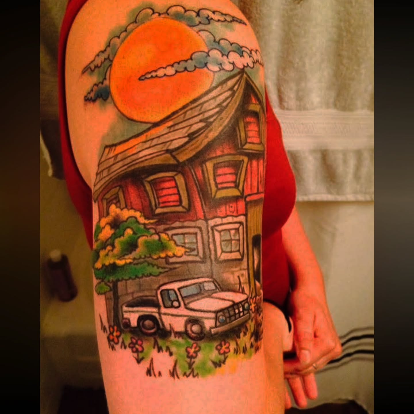 House and truck American traditional tattoo on the forearm by Shane Watkins