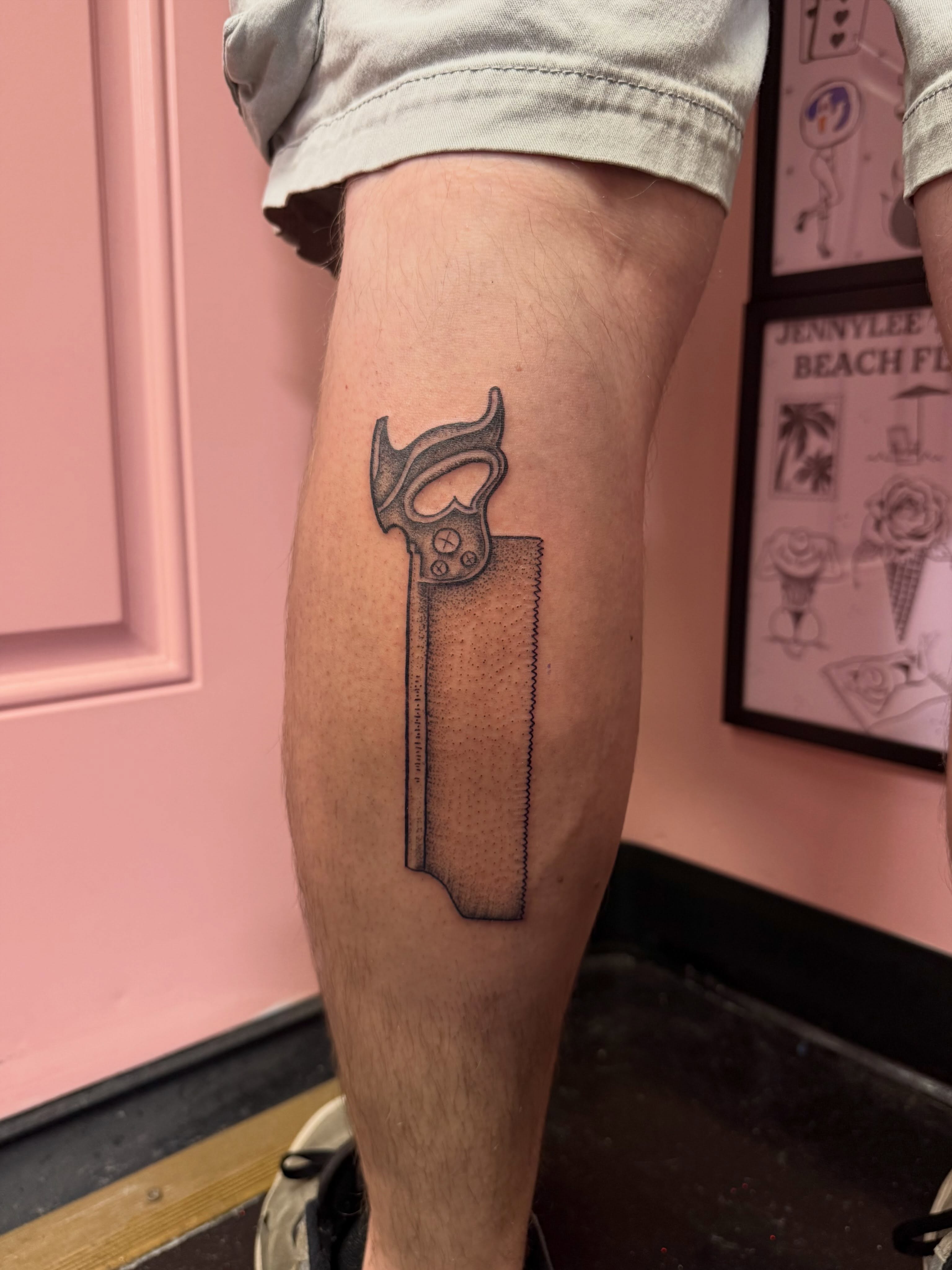 Saw black and grey tattoo on the forearm by Jennylee Aerts, Asbury Park, New Jersey