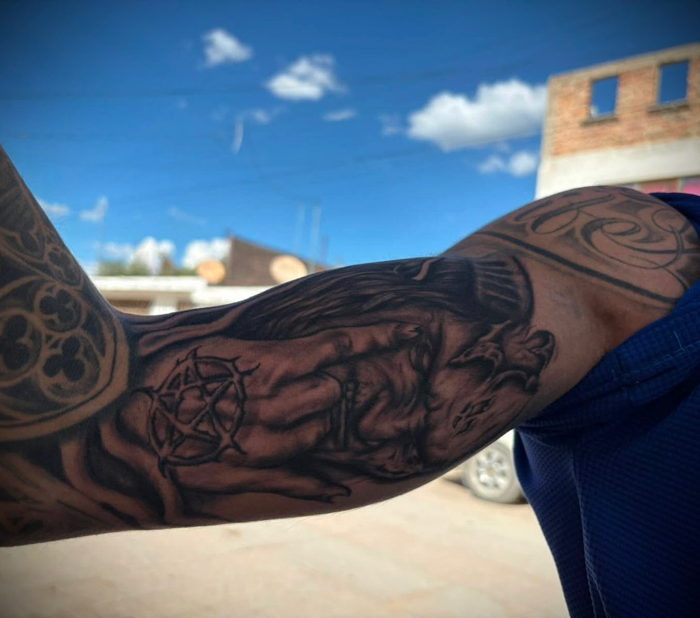 Jesus Christ realism tattoo on the forearm by Tu SanchoTattoos