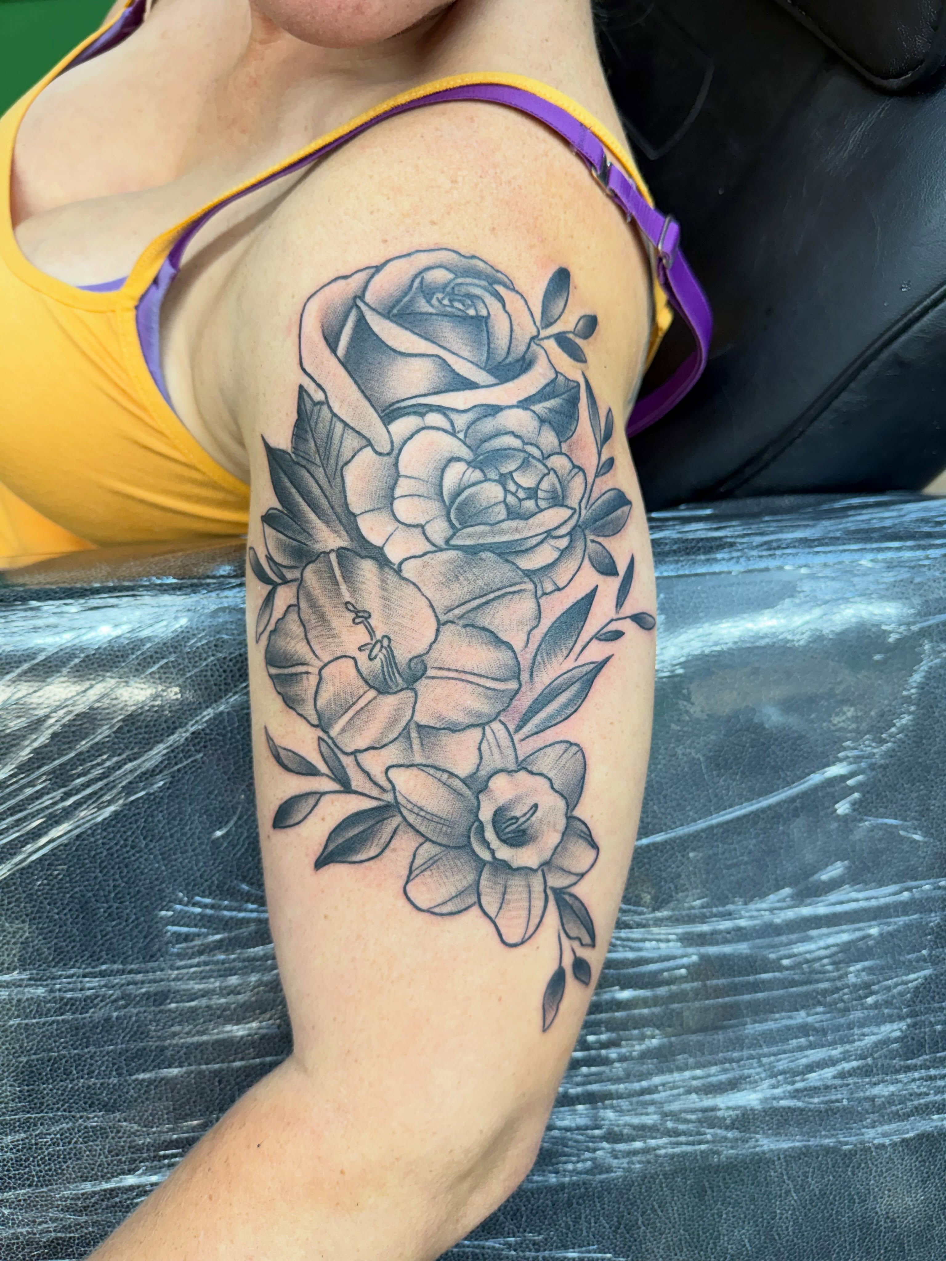 Floral arrangement black and grey tattoo on the forearm by Josh Roberts, Franklin, Ohio