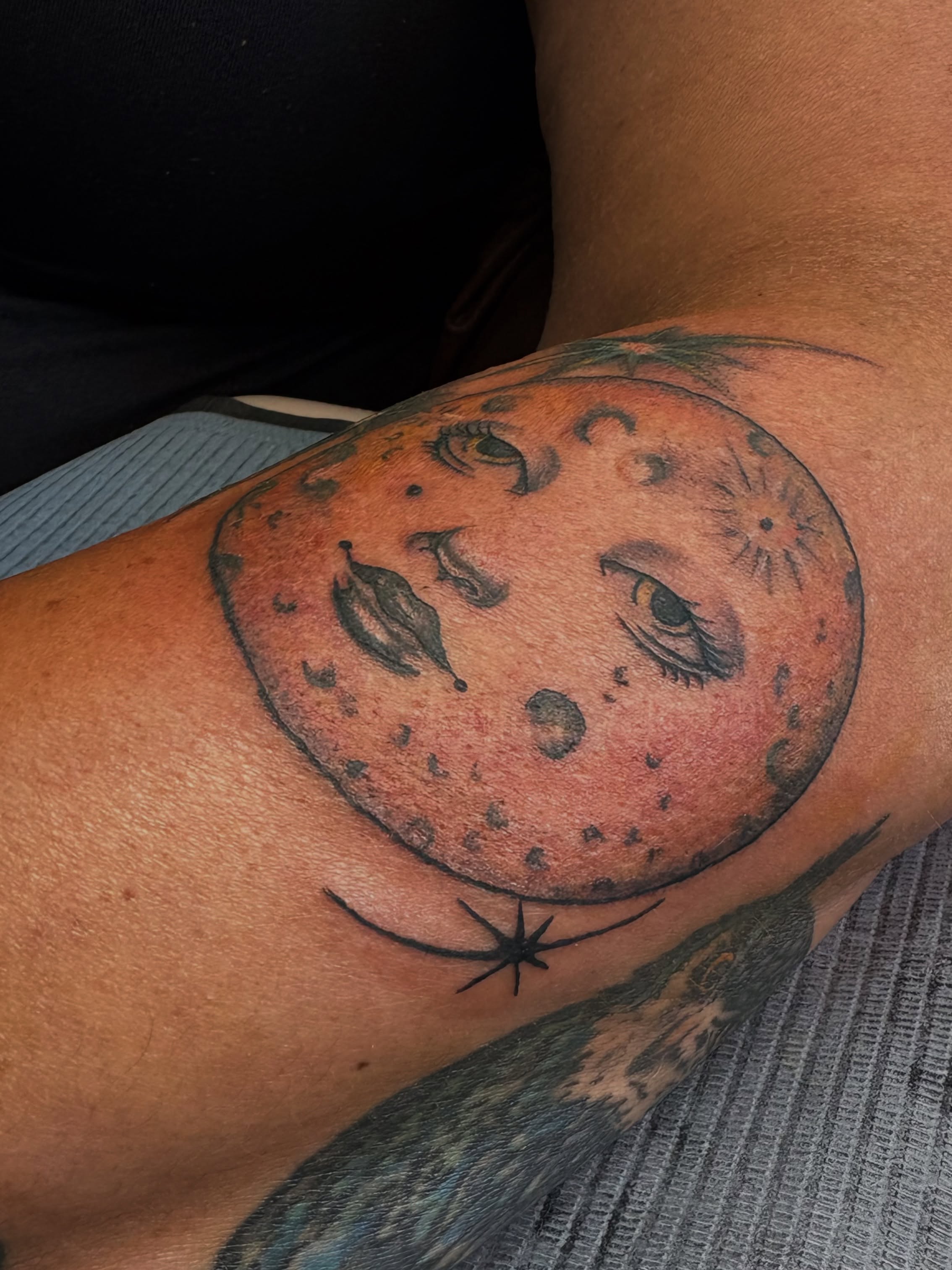 Moon face realism tattoo on the forearm by Casey - Tattooer, Salem, Massachusetts