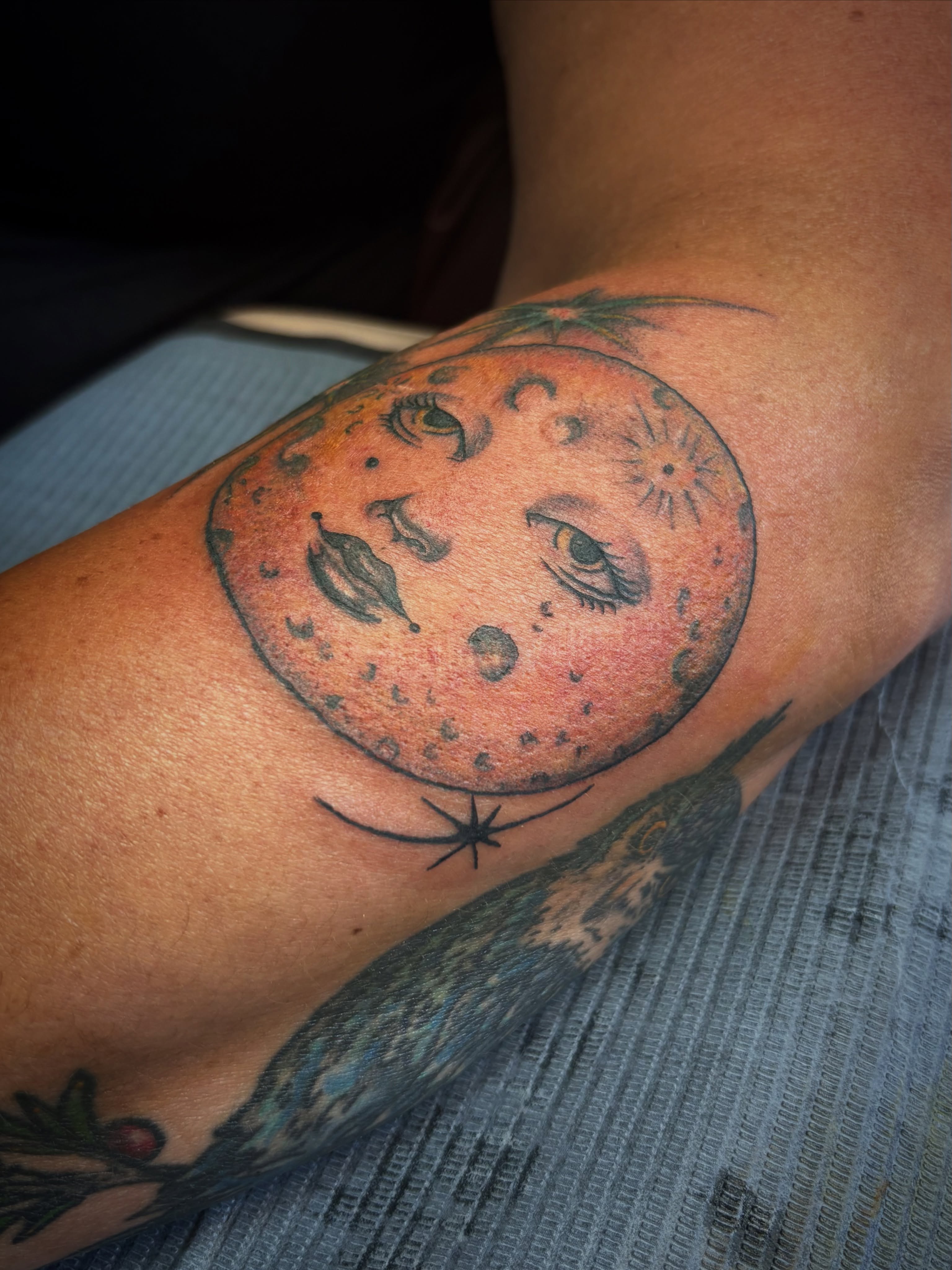 Moon American traditional tattoo on the forearm by Casey - Tattooer, Salem, Massachusetts
