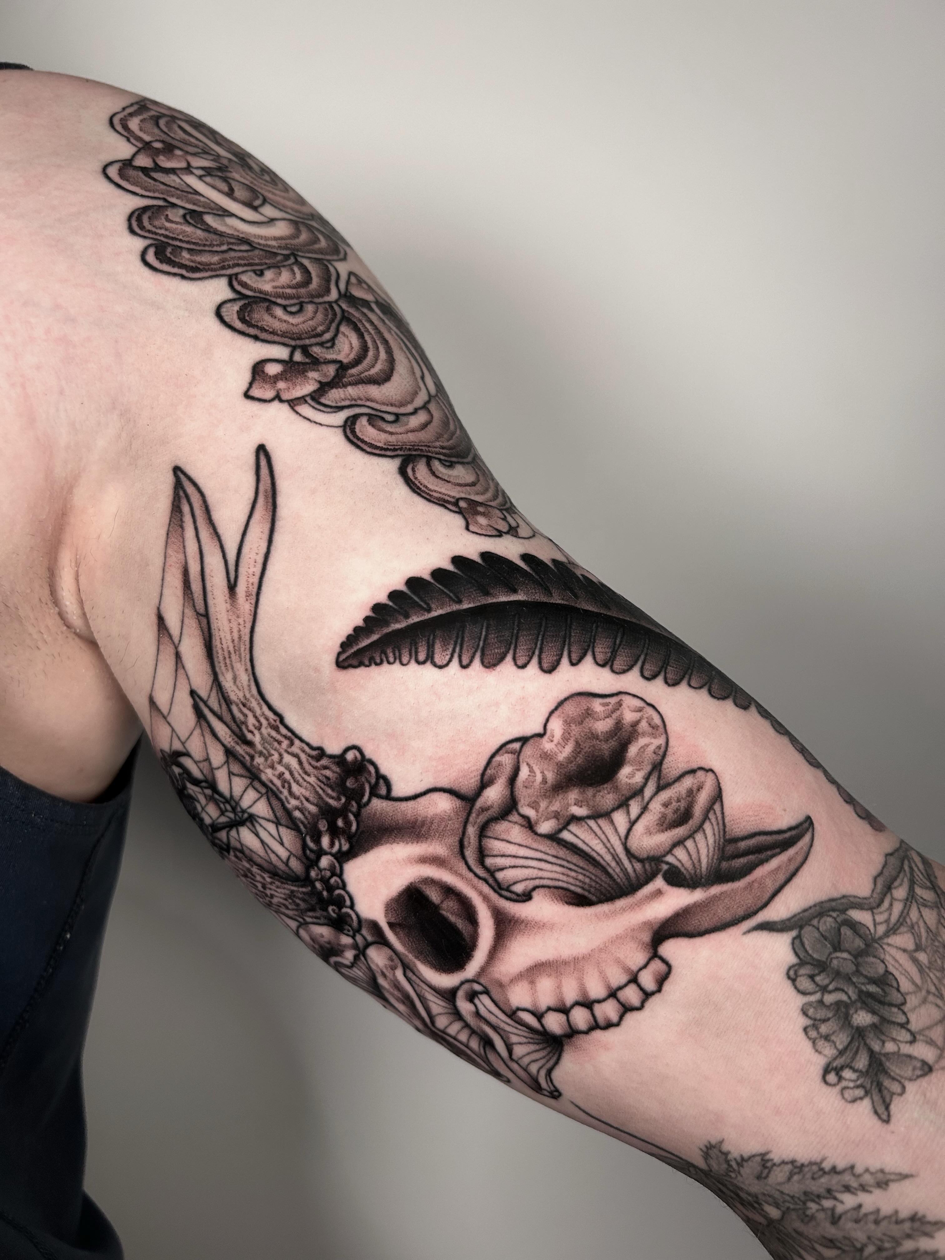 Mermaid and conch shell realism tattoo on the forearm by Salt Lake City tattoo artist