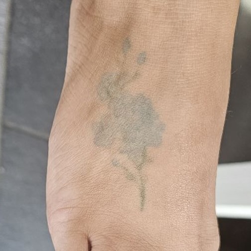 Rose black and grey tattoo on the foot by elly, Oakham