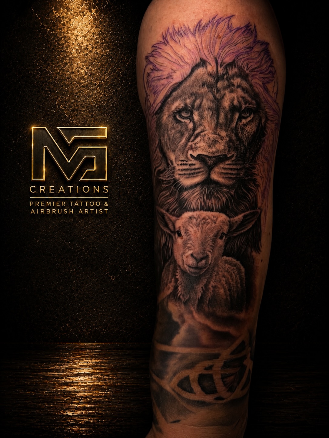 Lion and lamb realism tattoo on the forearm by Michael Getz