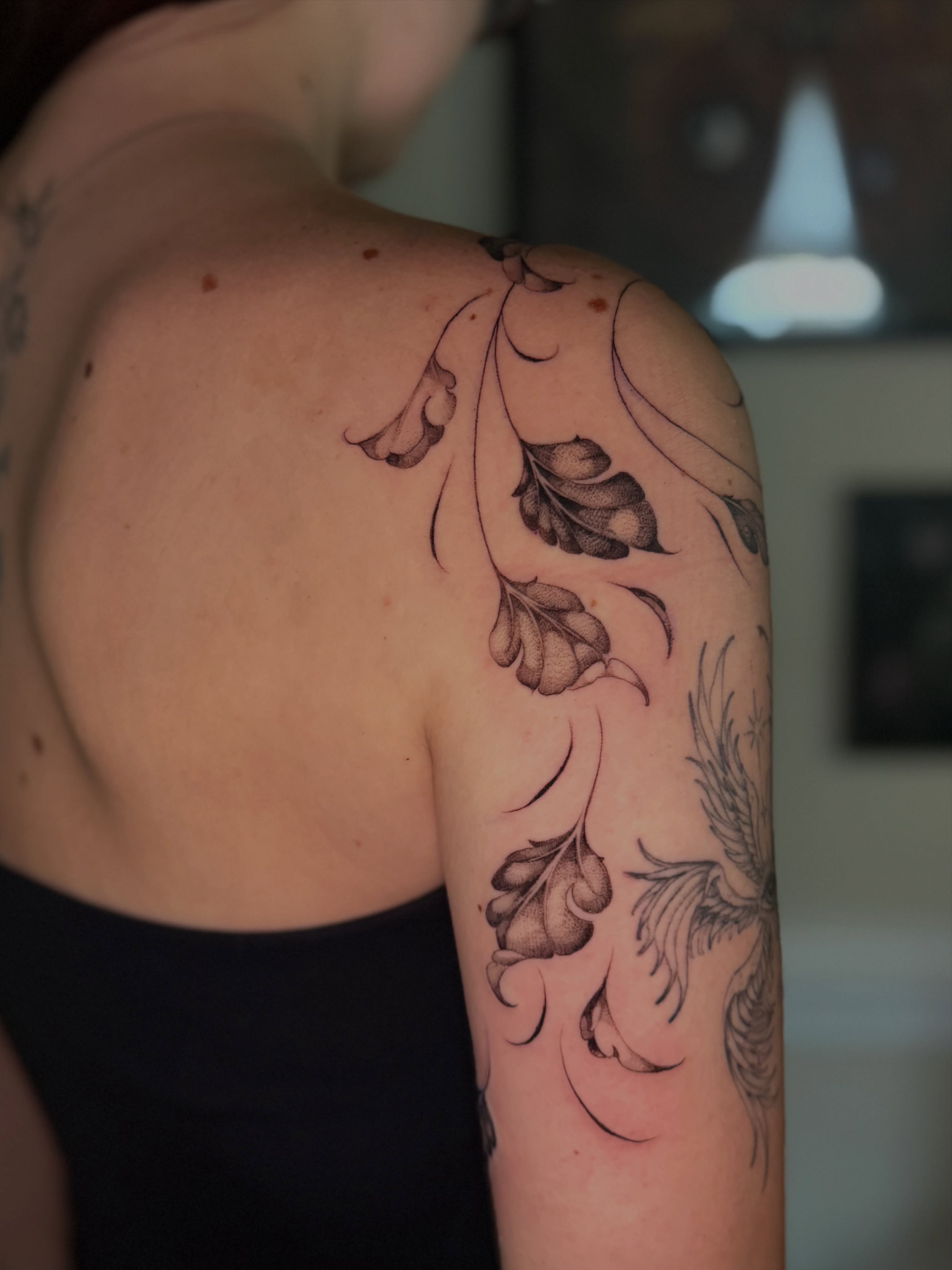 Floral vine black and grey tattoo on the shoulder by Chiah