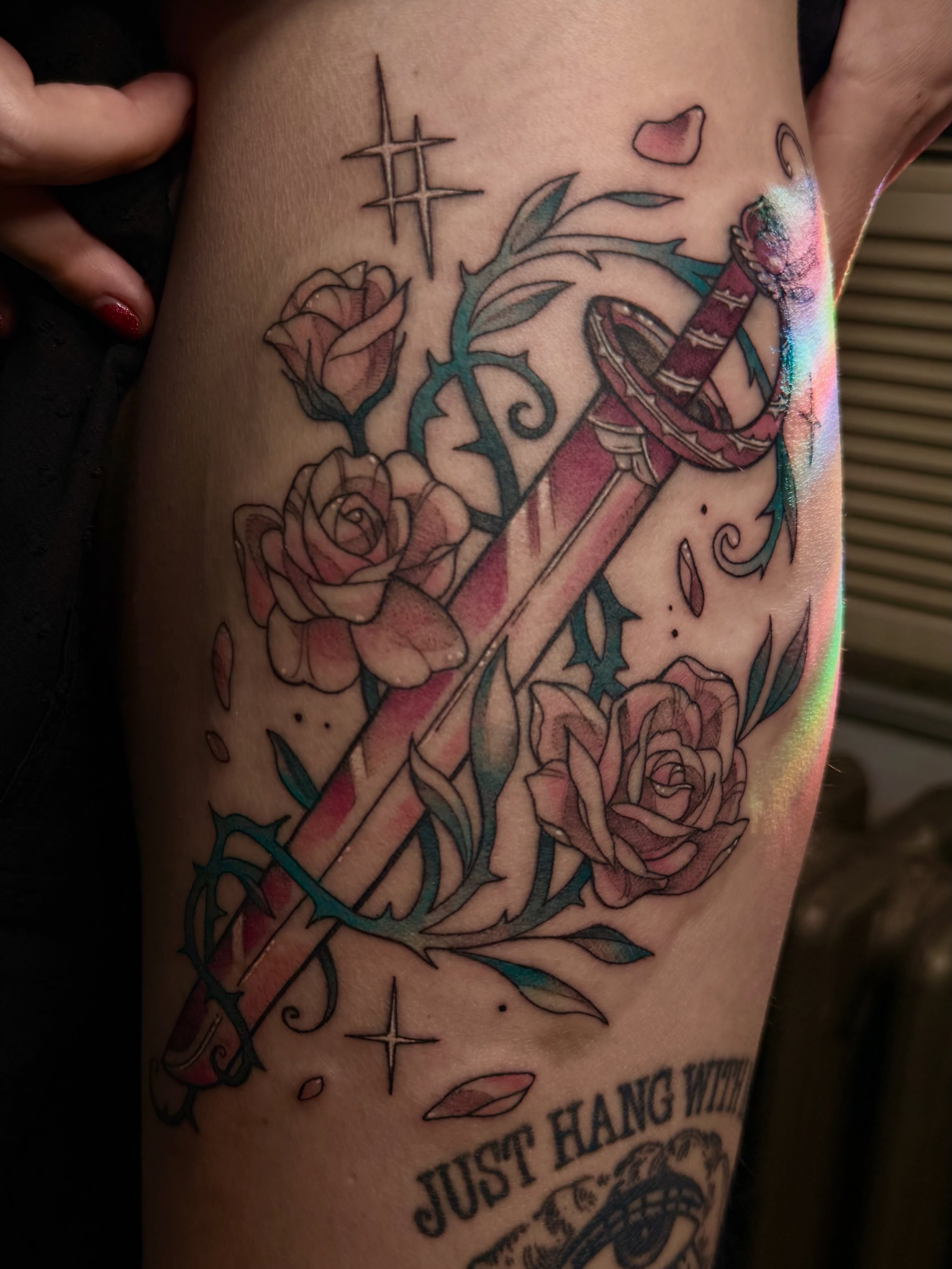 Katana and roses neo-traditional tattoo on the thigh by Jynx