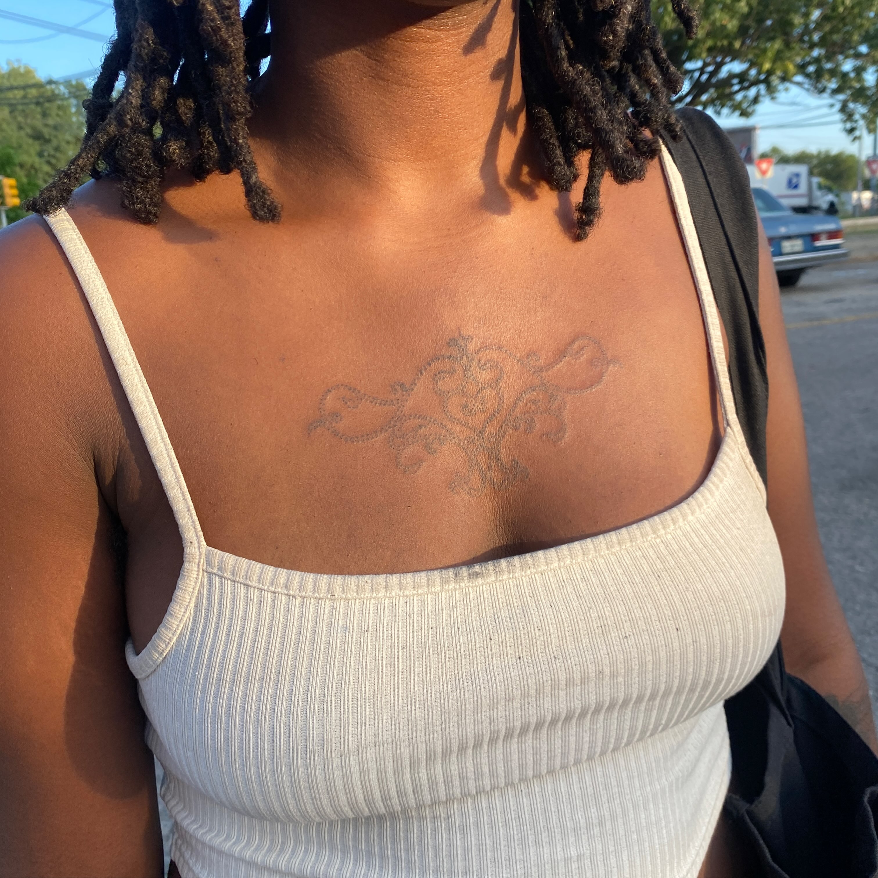 Scrollwork ornamental tattoo on the chest by °₊⊹ delia ✩ jane ೃ࿔*