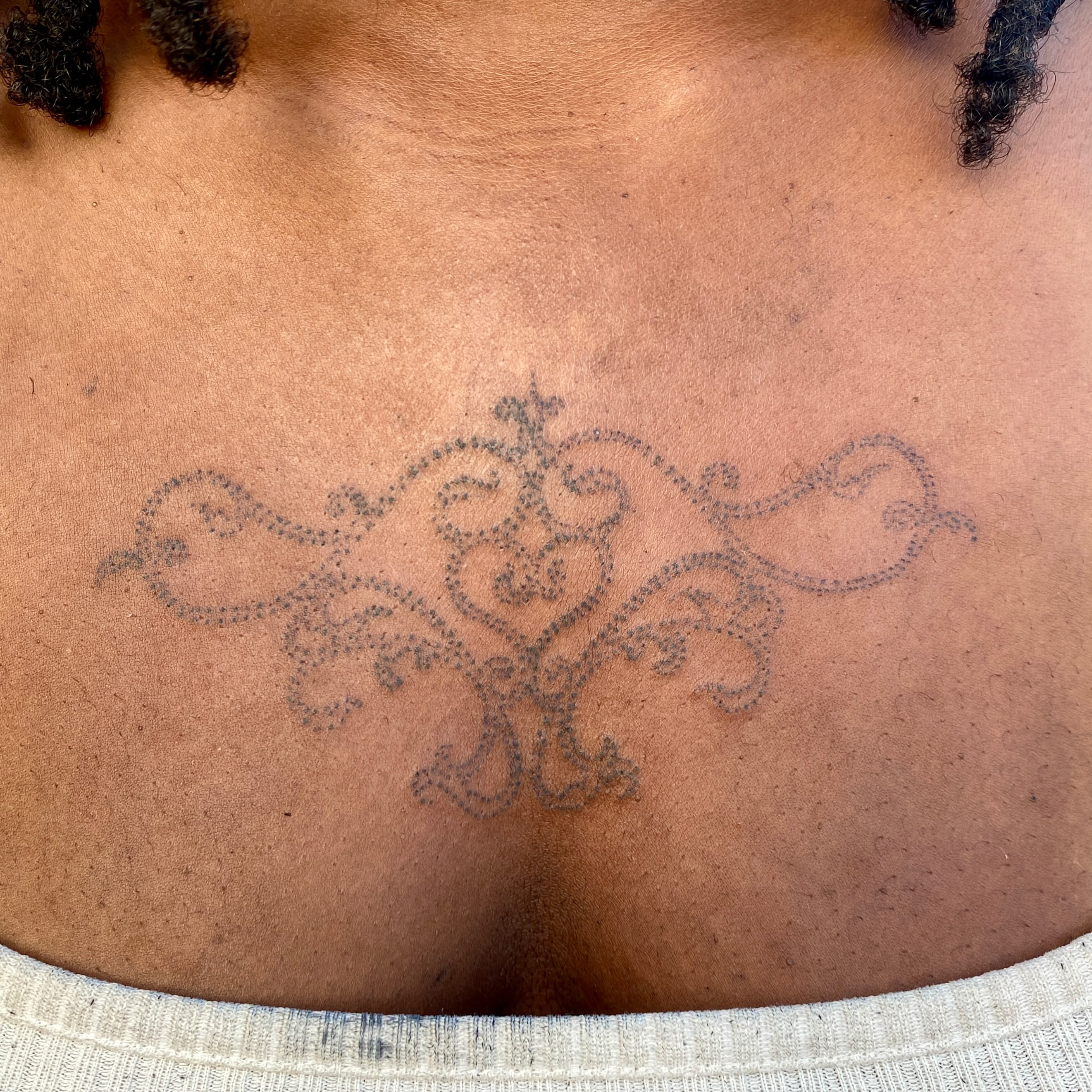 Floral design dotwork tattoo on the chest by °₊⊹ delia ✩ jane ೃ࿔*
