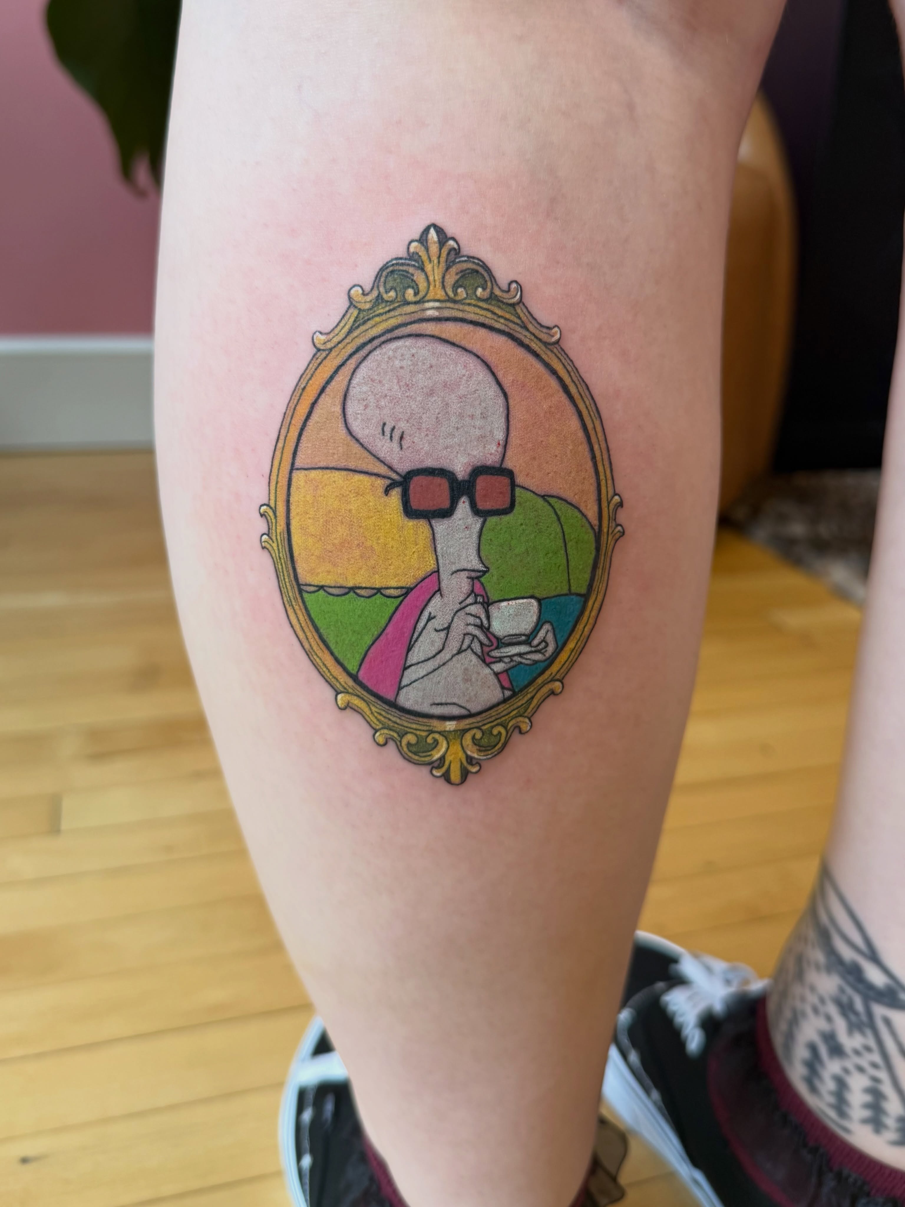 Alien drinking coffee illustrative tattoo on the thigh by Kelsey Lynn▪️Raleigh Tattoo Artist
