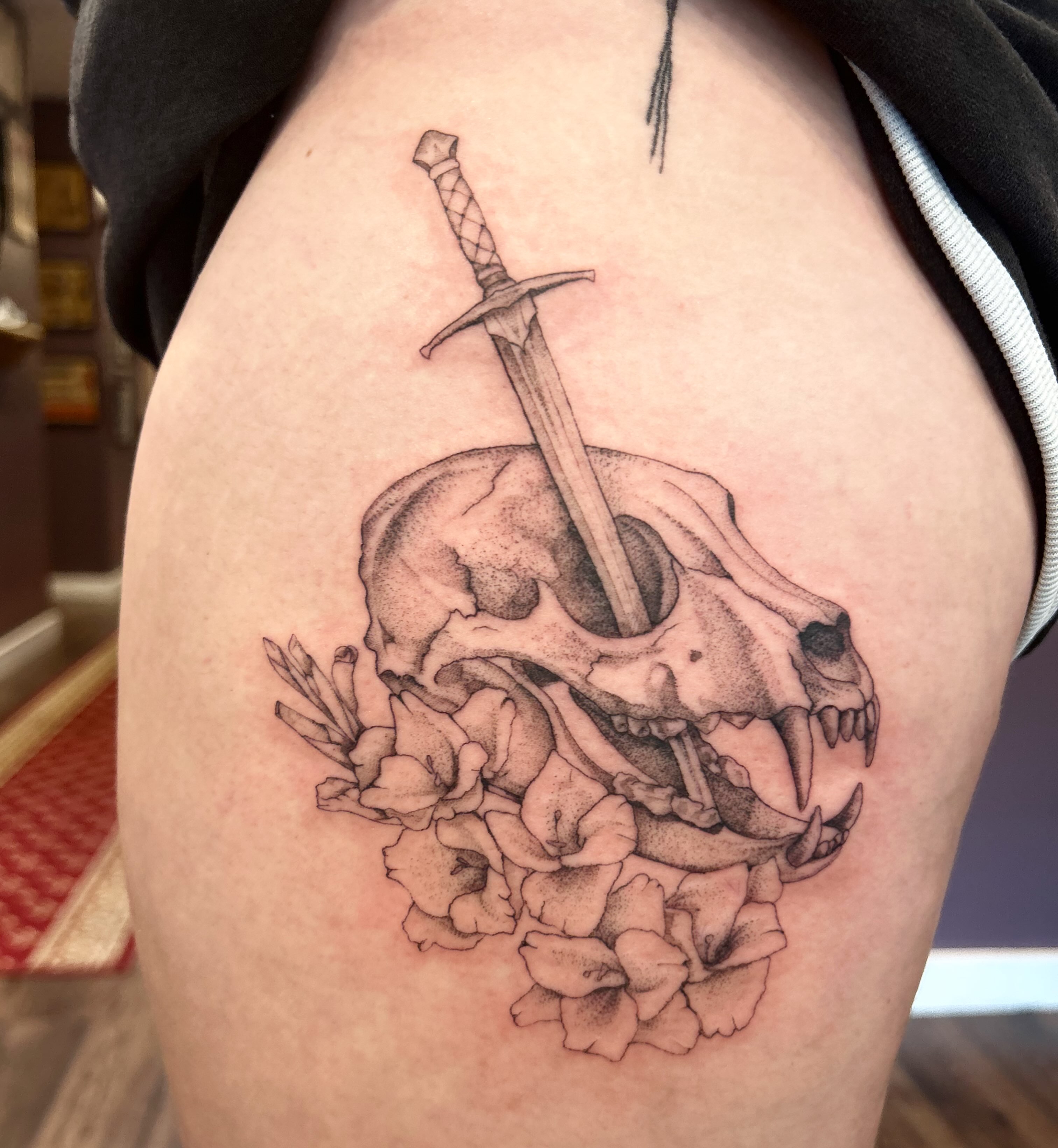Skull and sword realism tattoo on the thigh by Elizabeth (Lib), Murfreesboro, Tennessee