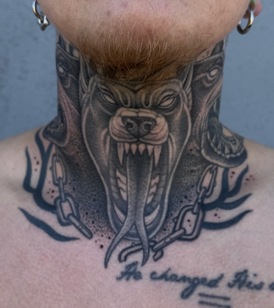 Angry wolf dark realism tattoo on the neck by Austin Tattoo Artist