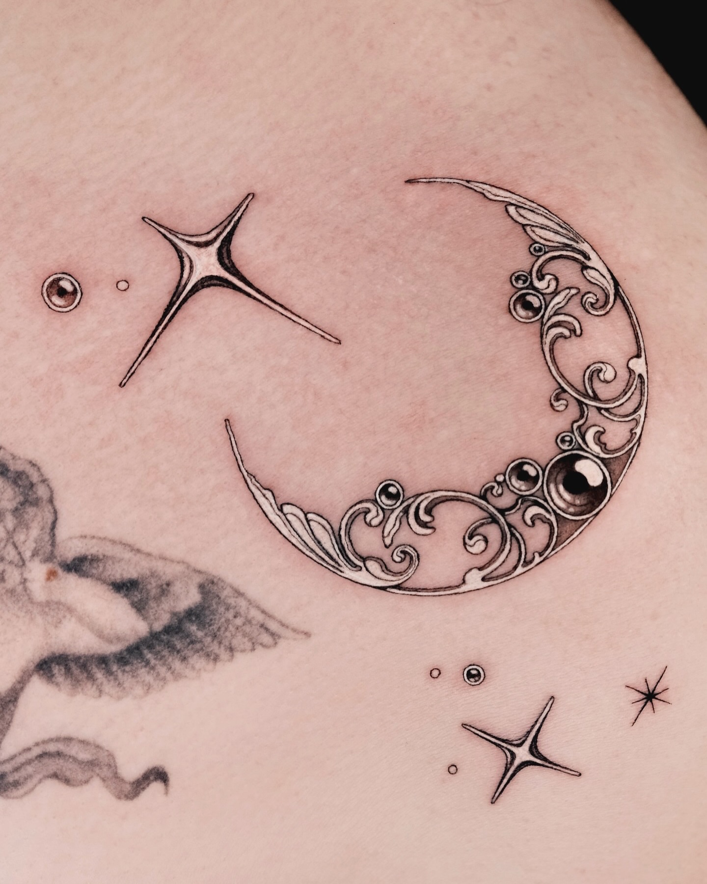 Moon and stars ornamental tattoo on the thigh by p o b i