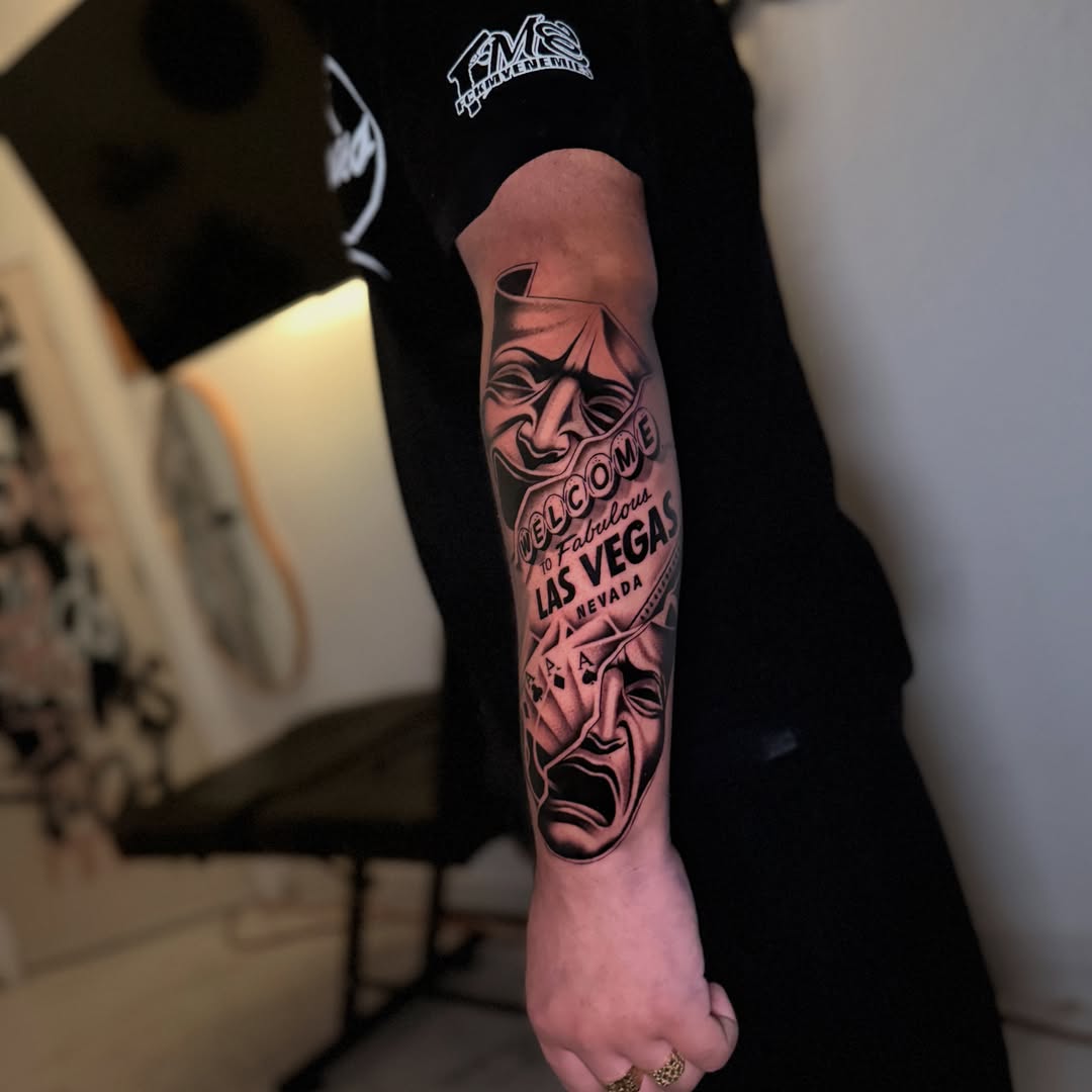 Las Vegas sign black and grey tattoo on the forearm by InkbyCasillas