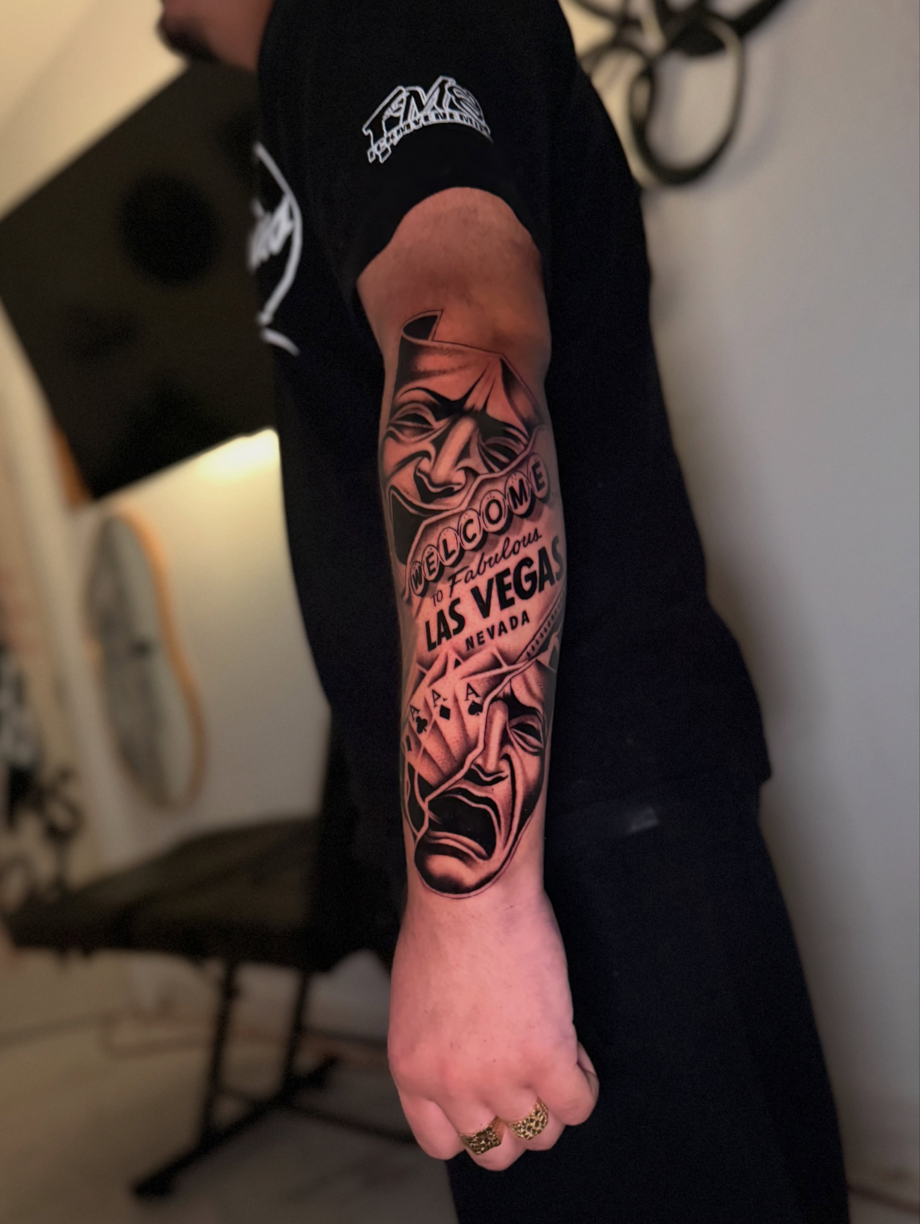 Welcome sign black and grey tattoo on the forearm by InkbyCasillas