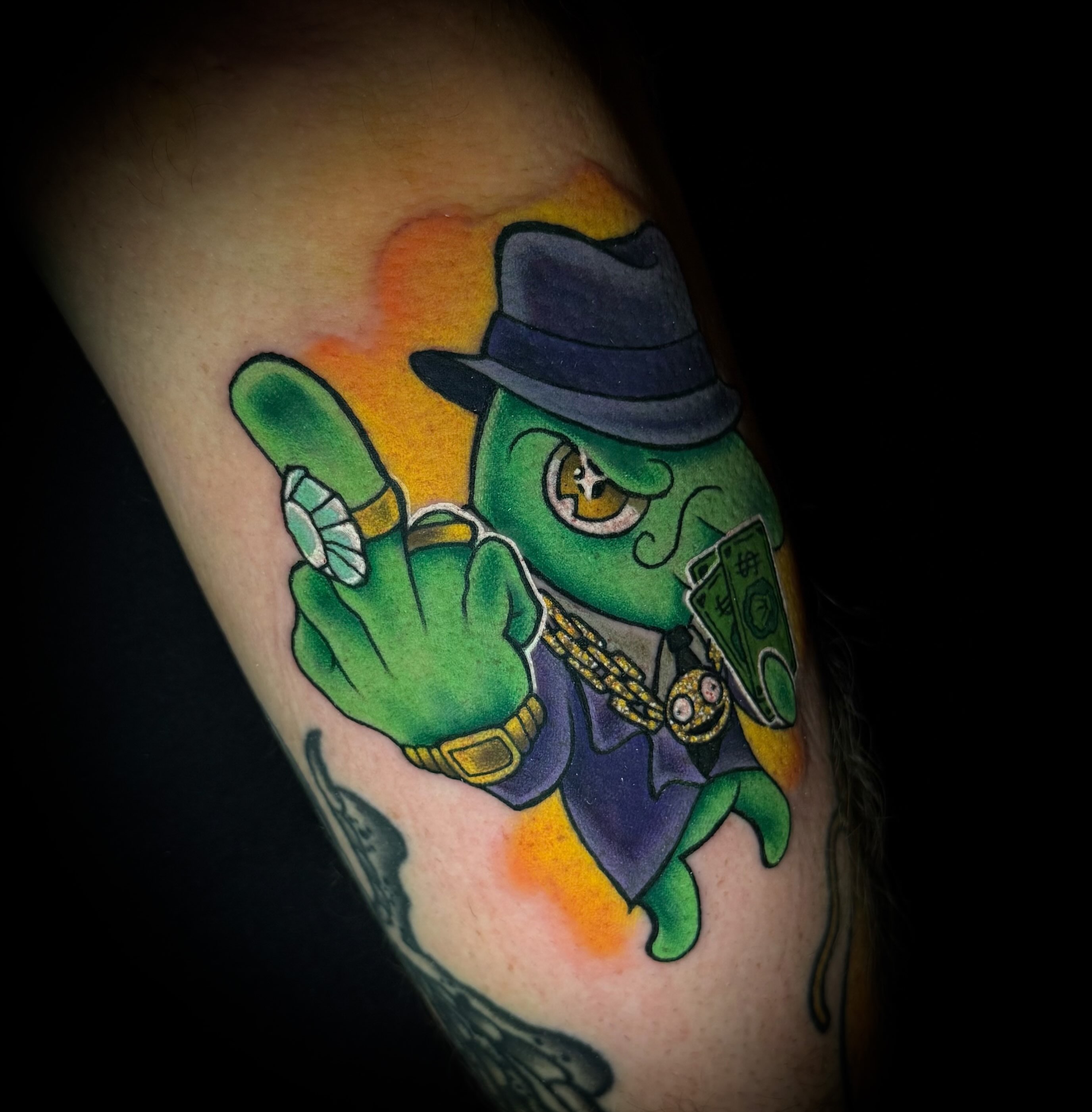 Frog wearing hat American traditional tattoo on the forearm by Savannah Duff