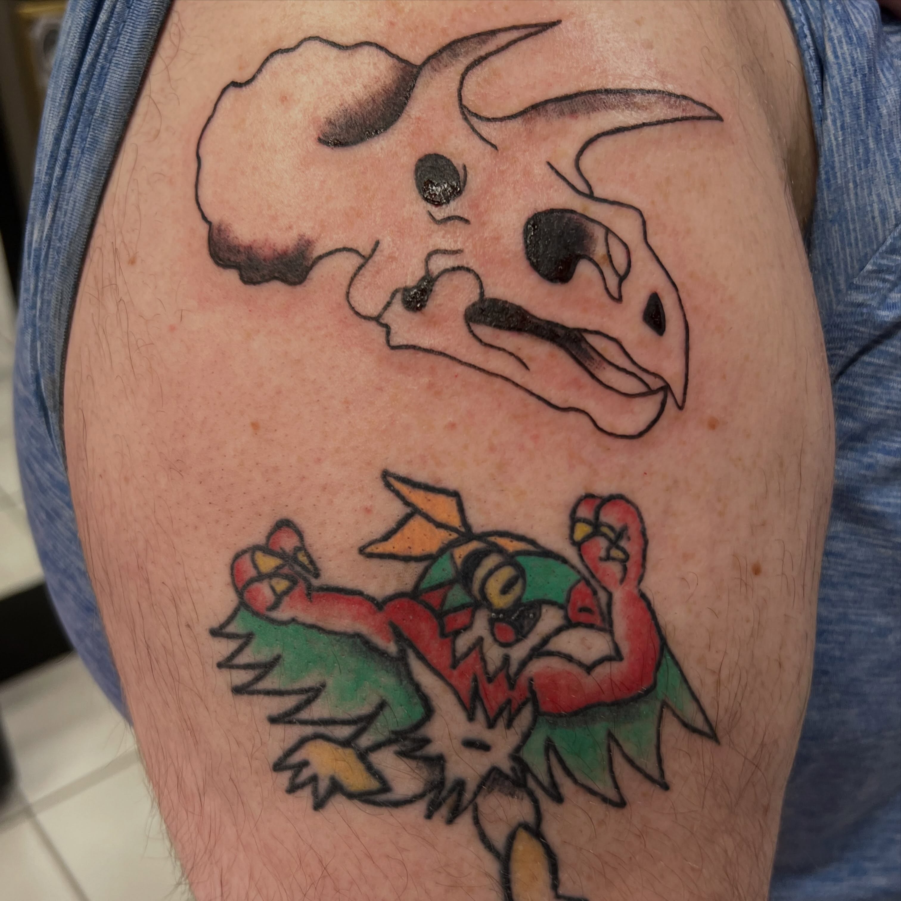 Animal and character American traditional tattoo on the thigh by Tomfoolery