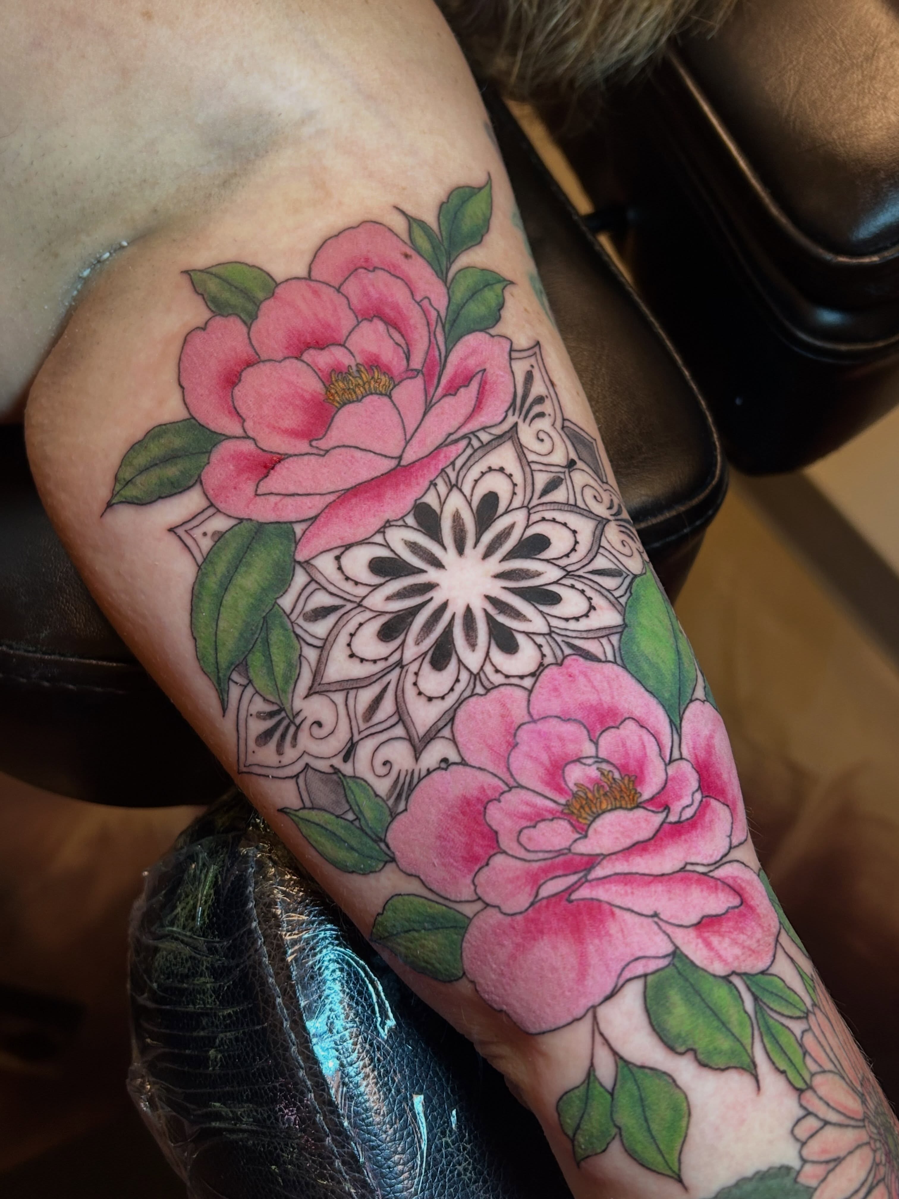 Peony flowers new school tattoo on the forearm by Ashlee Mshar