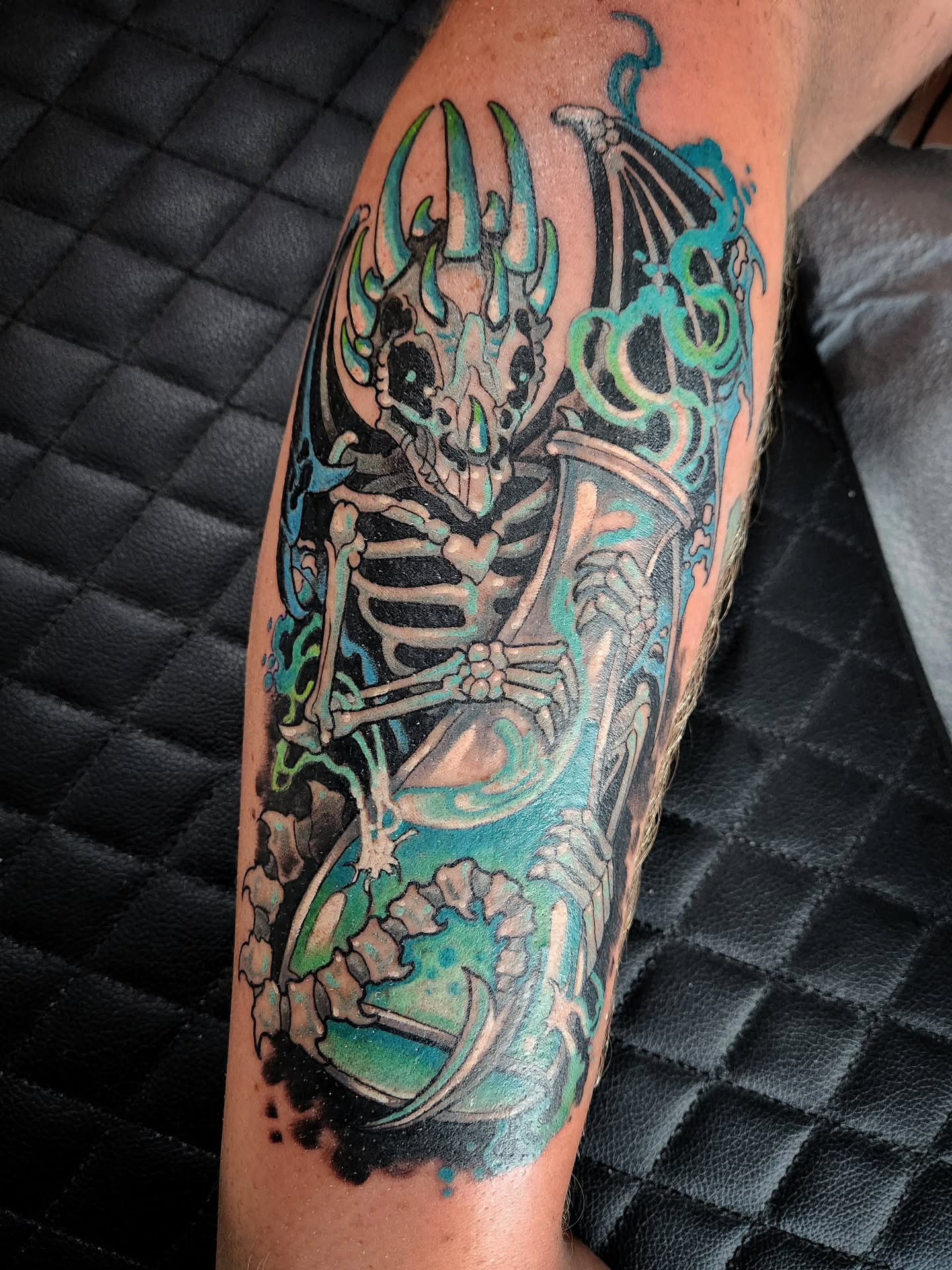 Skeleton with flames neo-traditional tattoo on the forearm by Randy