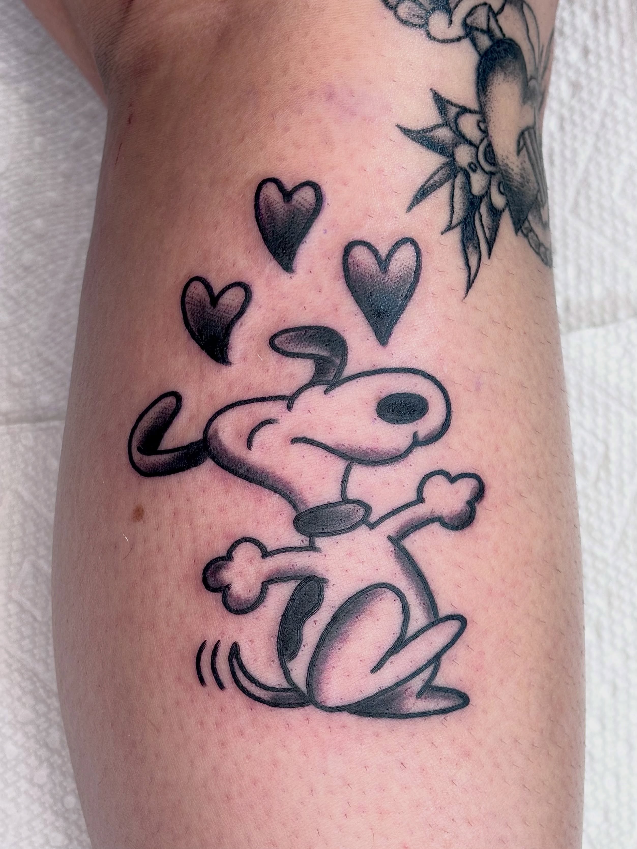 Snoopy black and grey tattoo on the forearm by ★ ★ ★ Matt Reinstone ★ ★ ★
