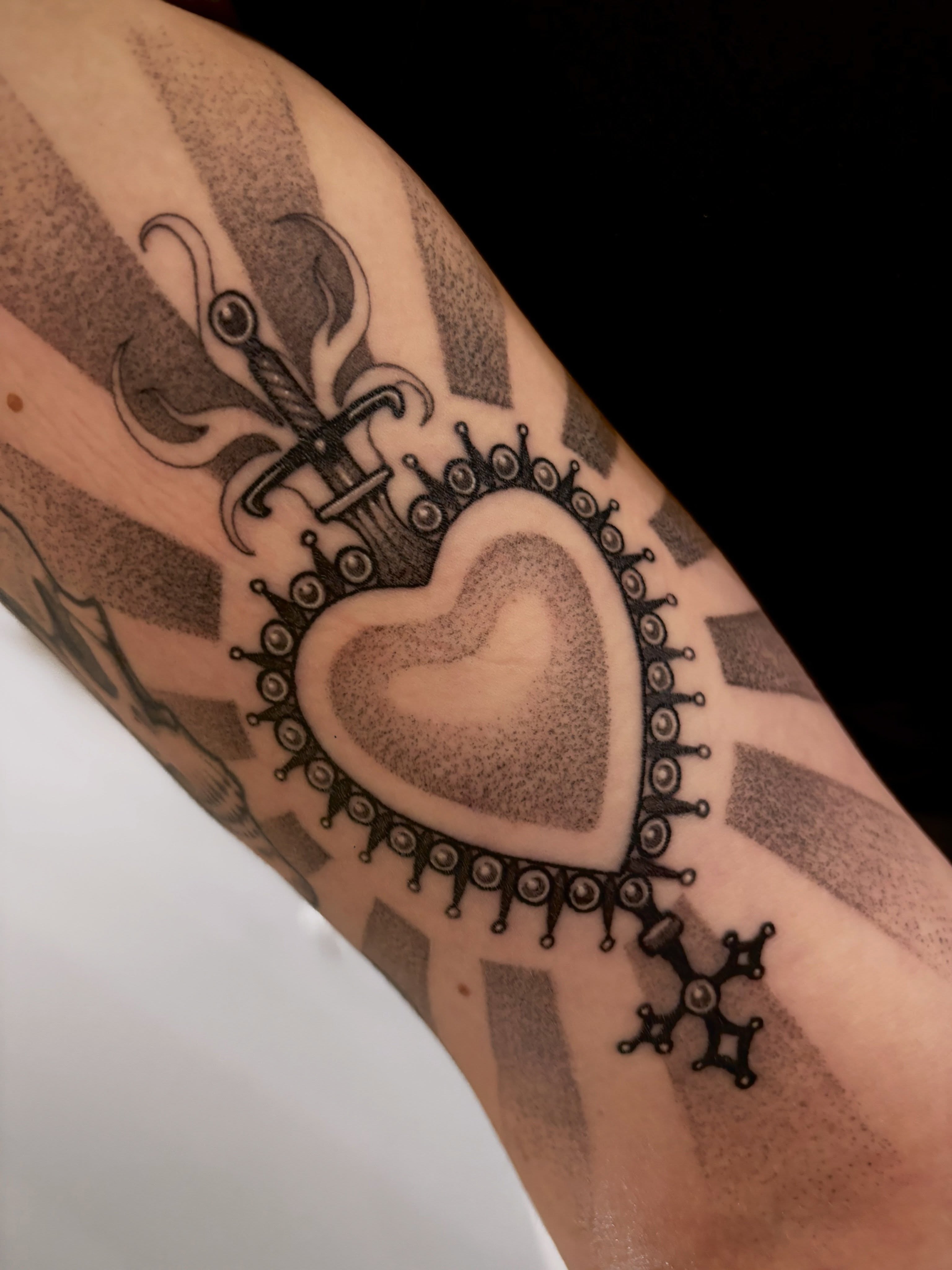 Heart with crown dotwork tattoo on the forearm by Tara, Exeter, Pennsylvania