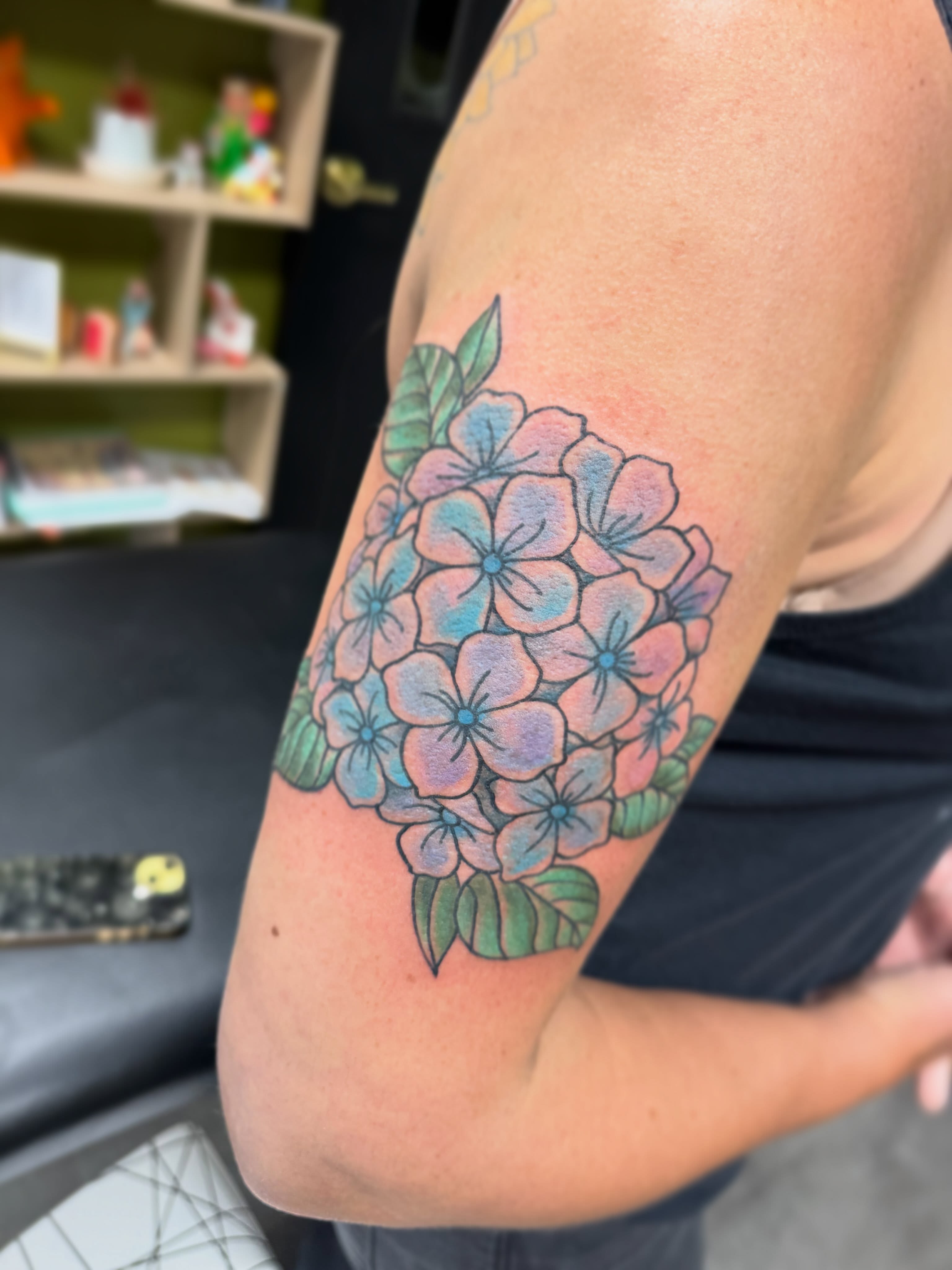Hydrangea bouquet new school tattoo on the forearm by 𝗞𝗮𝘁 𝗕𝗹𝗮𝗻𝗸𝗲𝗻𝘀𝗵𝗶𝗽