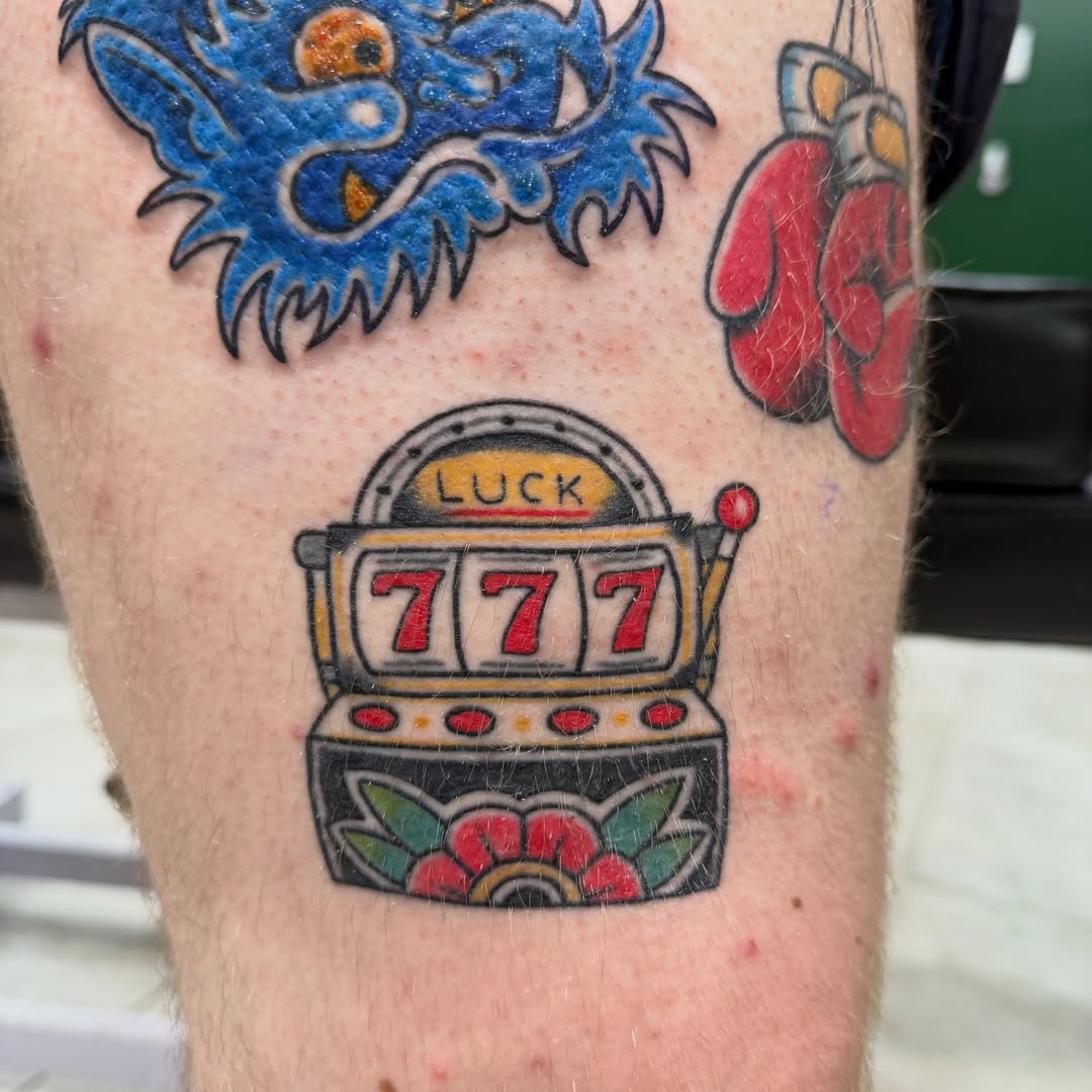 Slot machine American traditional tattoo on the leg by Squid