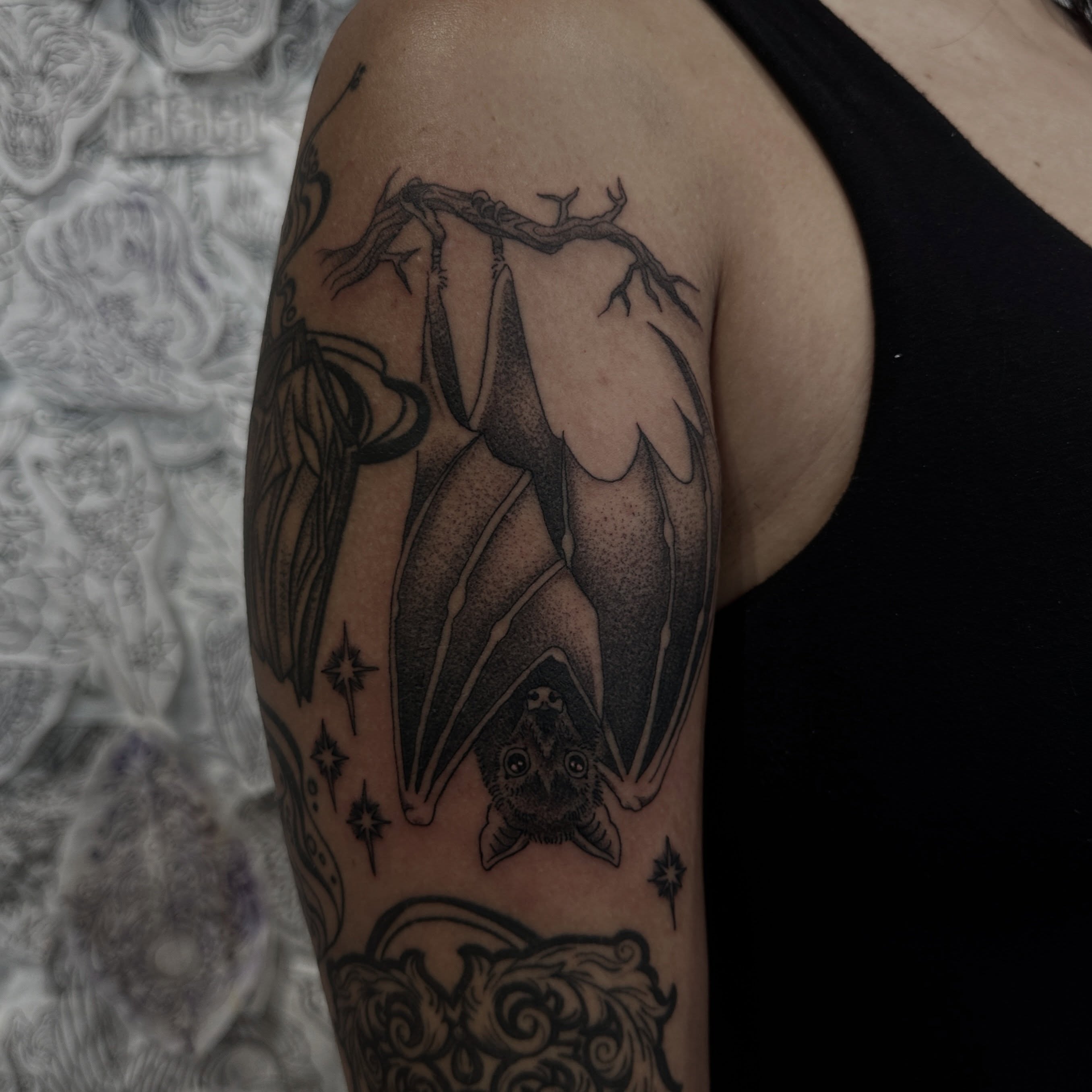 Bat hanging upside down dotwork tattoo on the upper arm by ππ¦π βπ¬π²π«π±π°