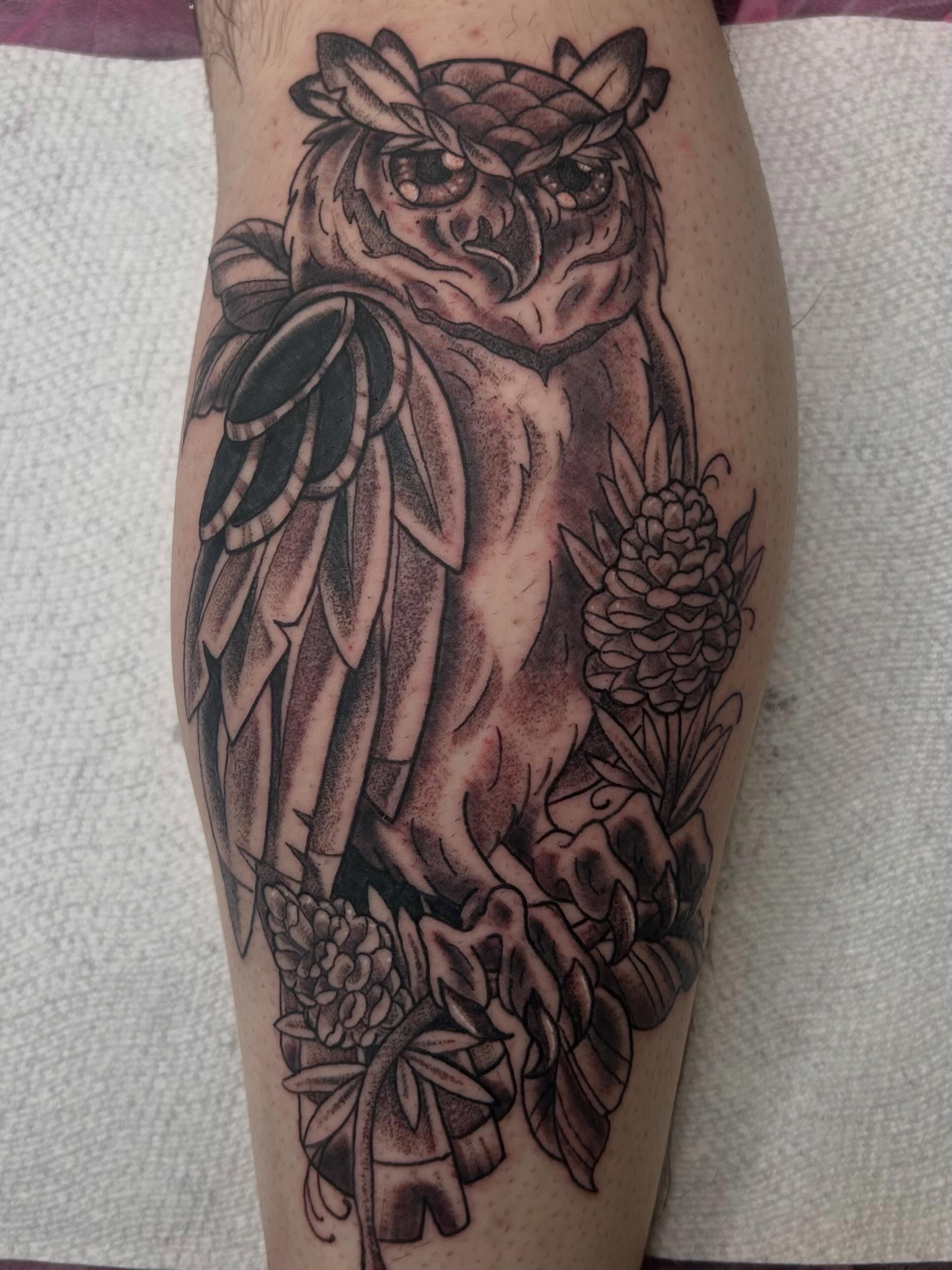 Owl dotwork tattoo on the forearm by Reilley Earles