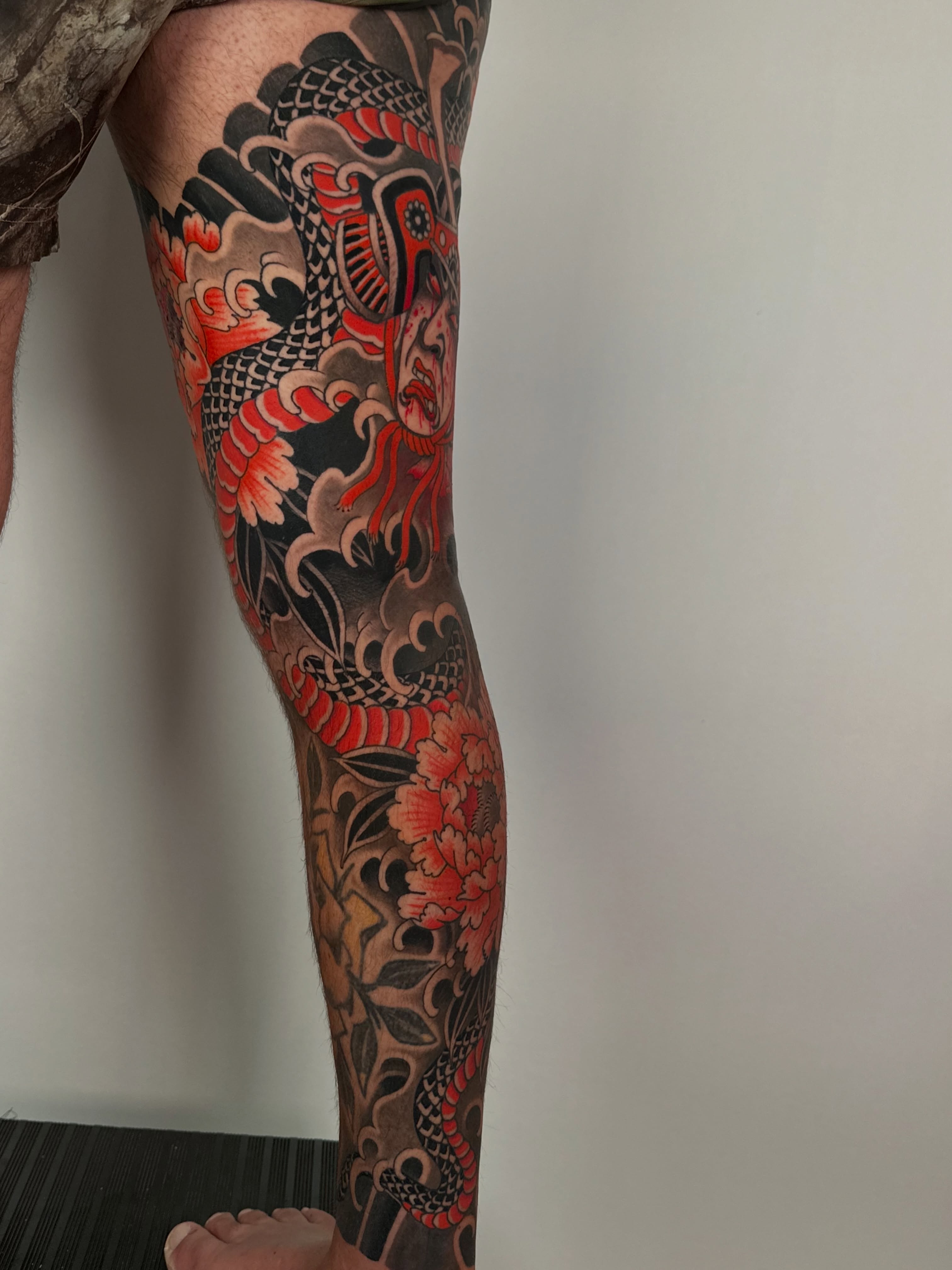 Dragon and peony japanese irezumi tattoo on the leg by Forrest Henderson 森