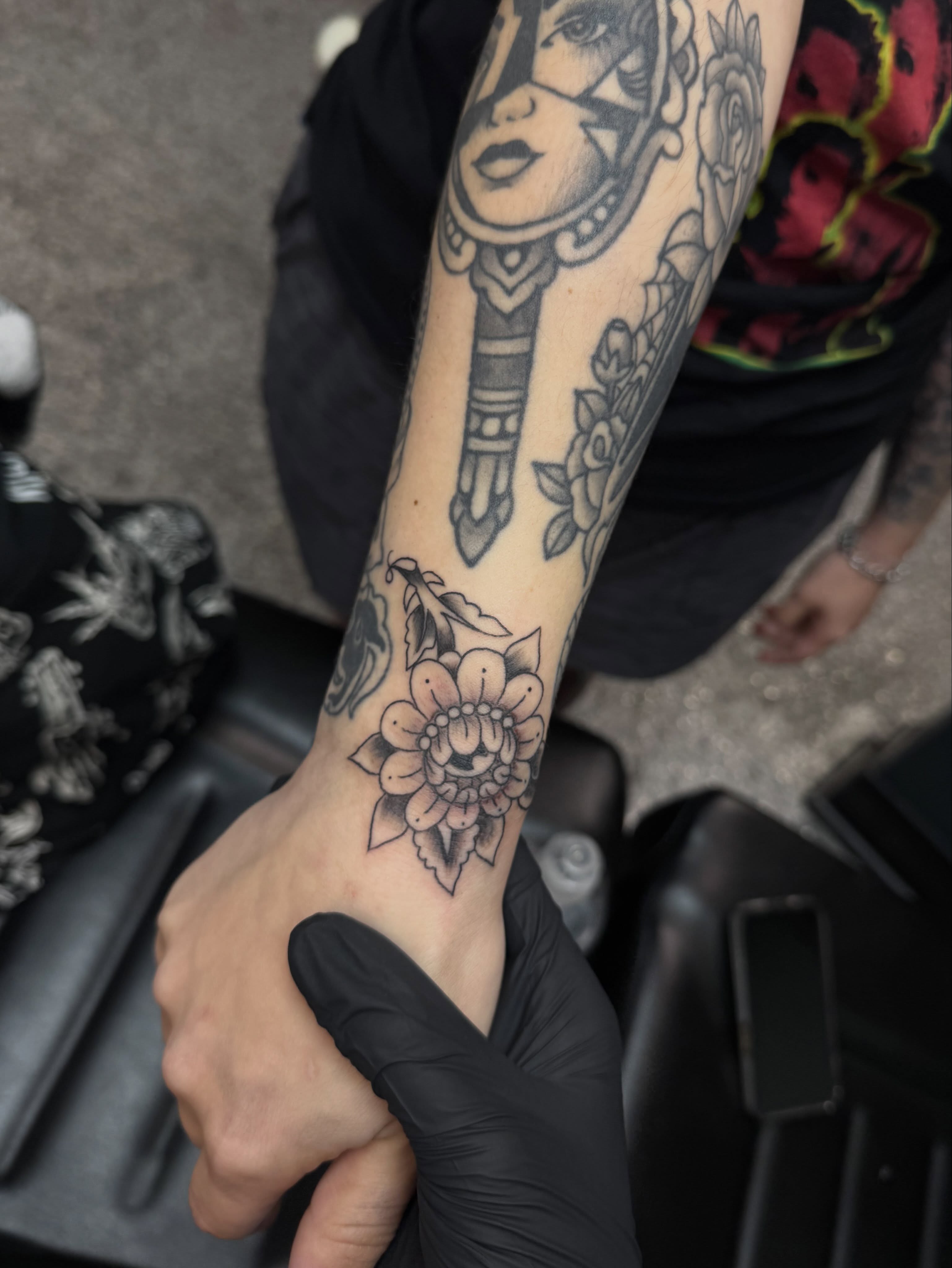 Tattoo by @pushingpigment1117 — black_and_grey