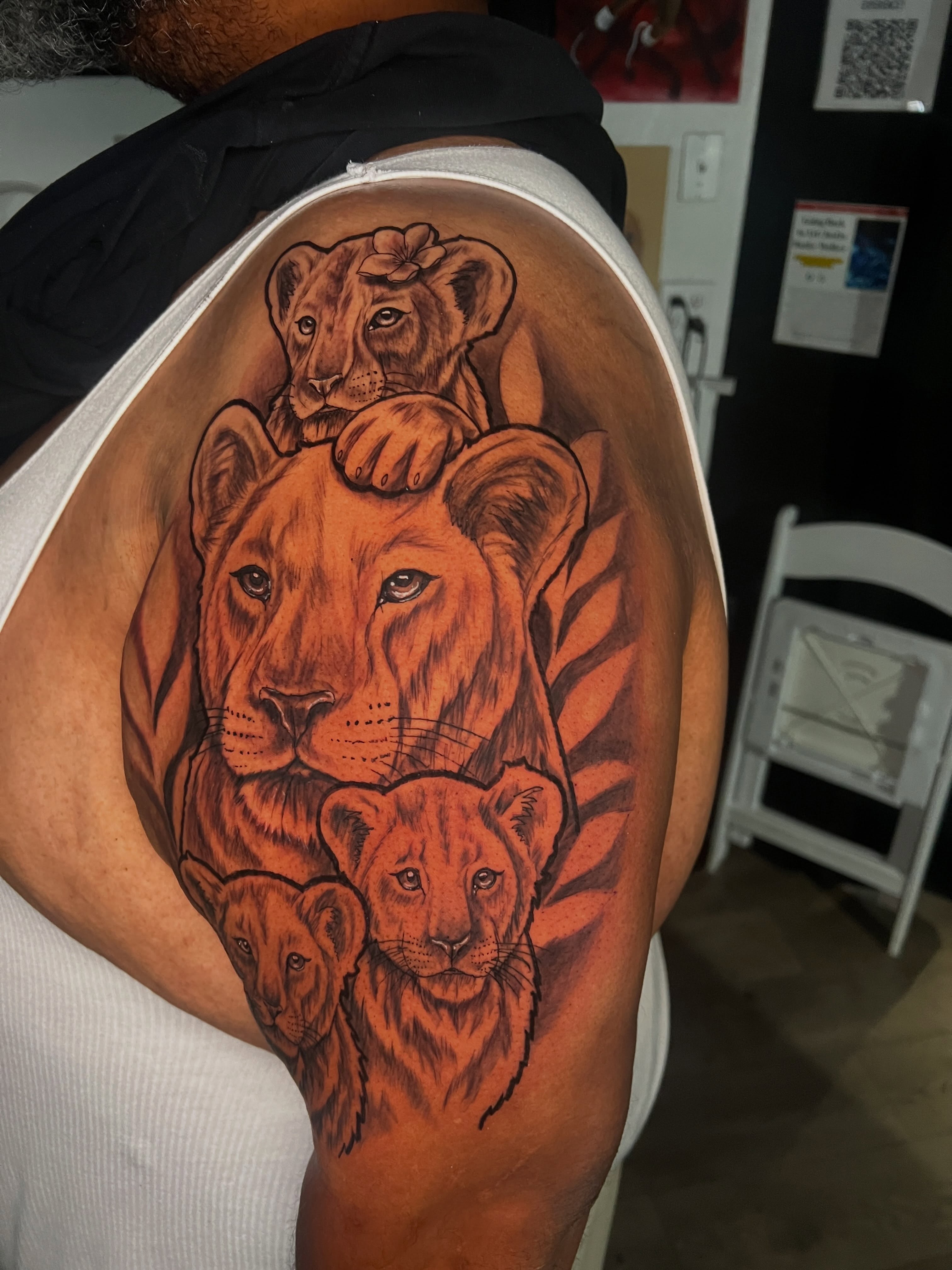 Lion family realism tattoo on the shoulder by Justx4rt