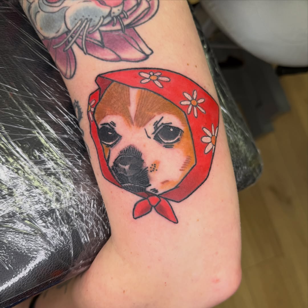 Dog wearing bandana realism tattoo on the forearm by Stvn Geyer, Urbandale, Iowa