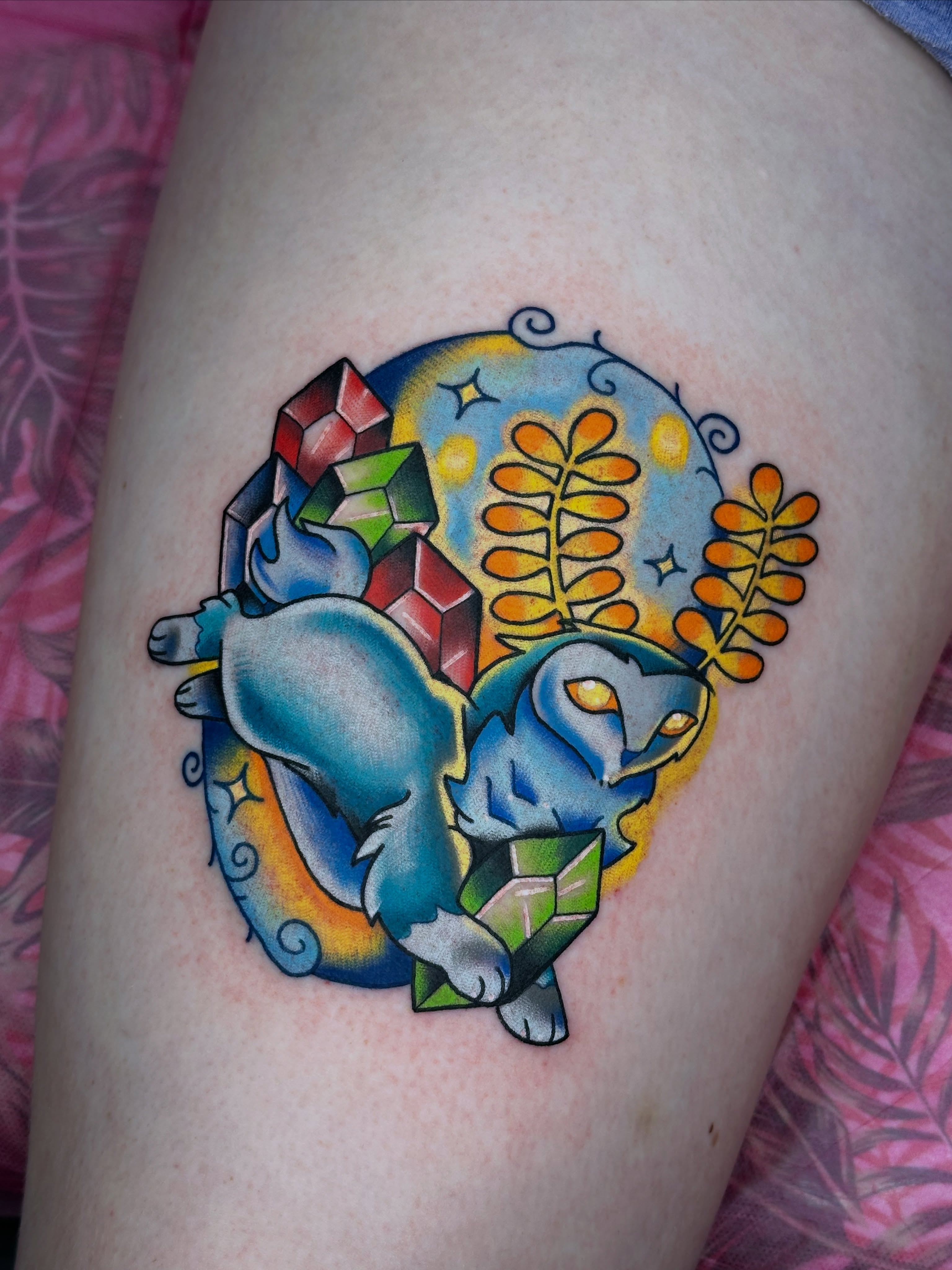 Blue cat with crystals American traditional tattoo on the thigh by Isabel