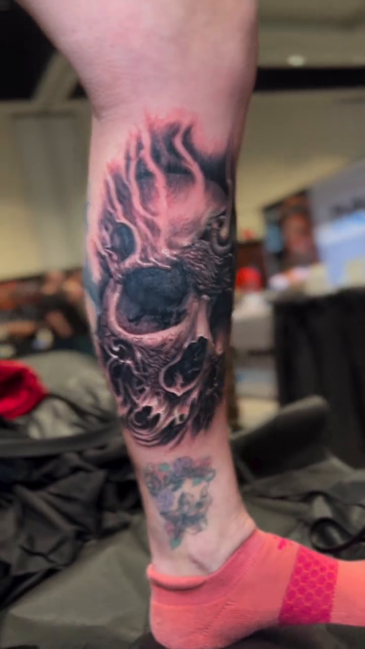 Skull with flames dark realism tattoo by Gabriel Londis