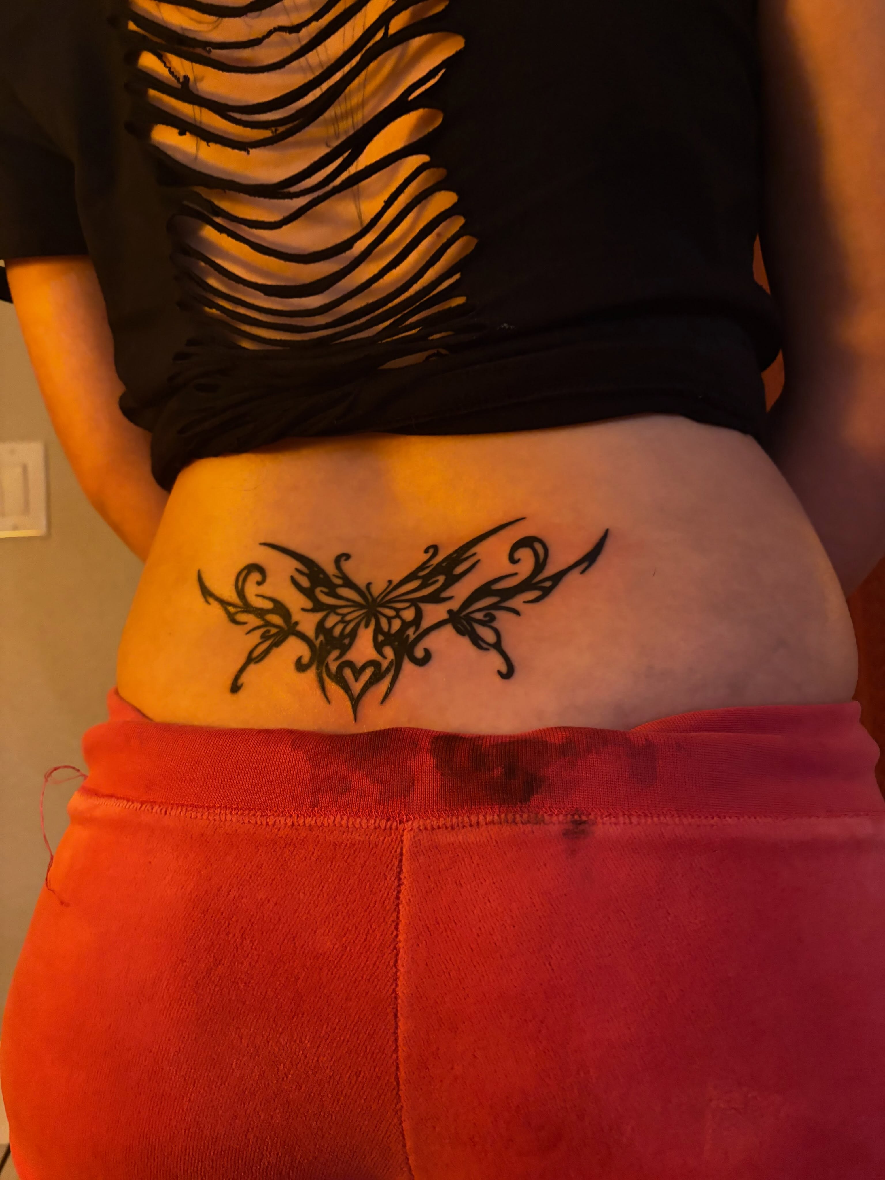 Butterfly tribal tattoo on the torso by blastedbybk