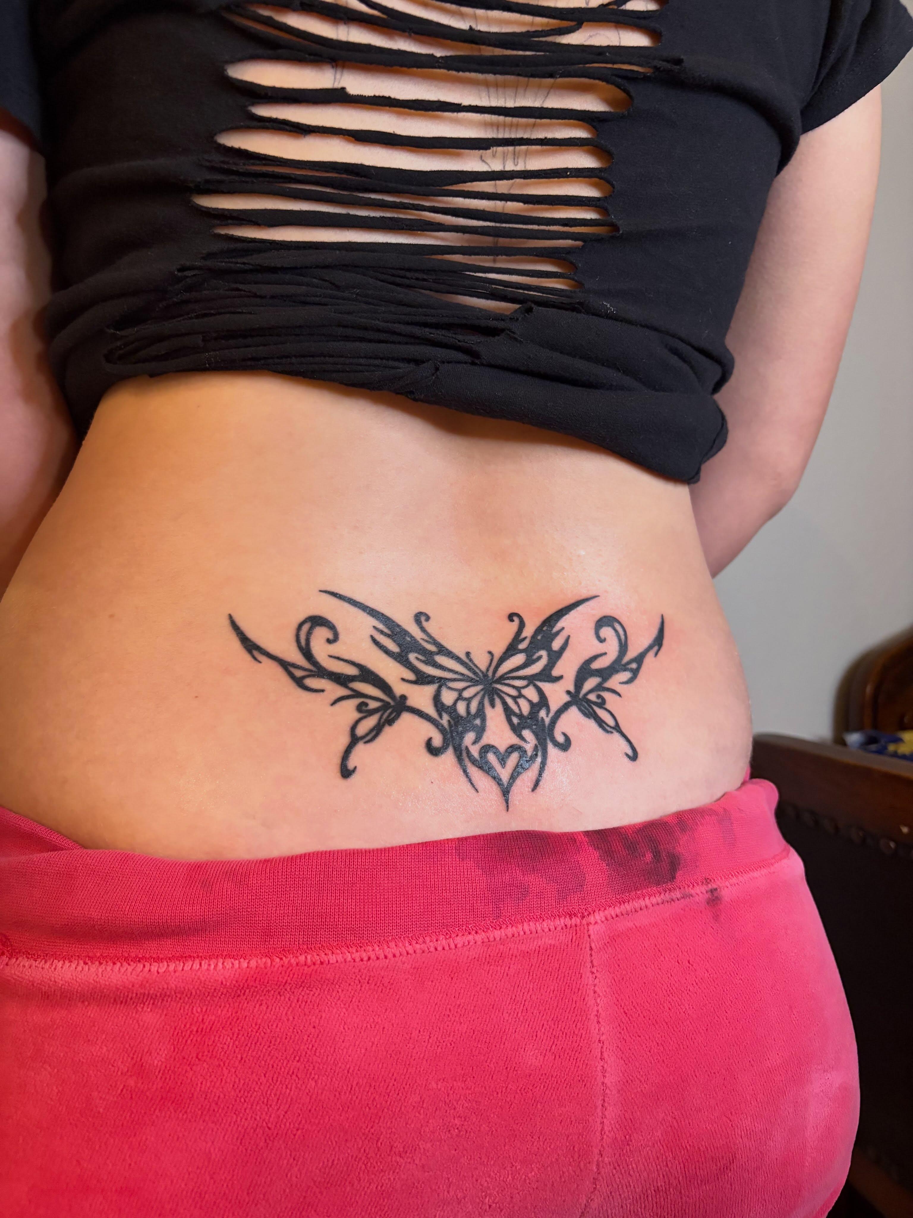 Butterfly tribal tattoo on the torso by blastedbybk