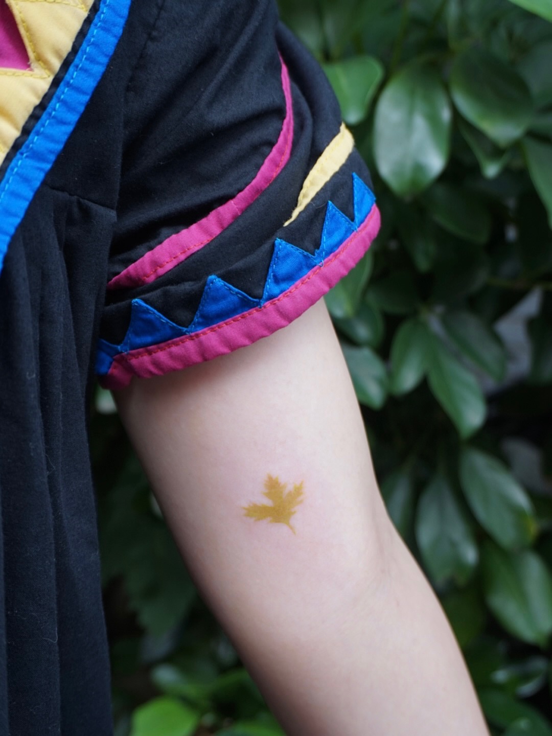 Maple leaf geometric tattoo on the forearm by 매실 * handpoke